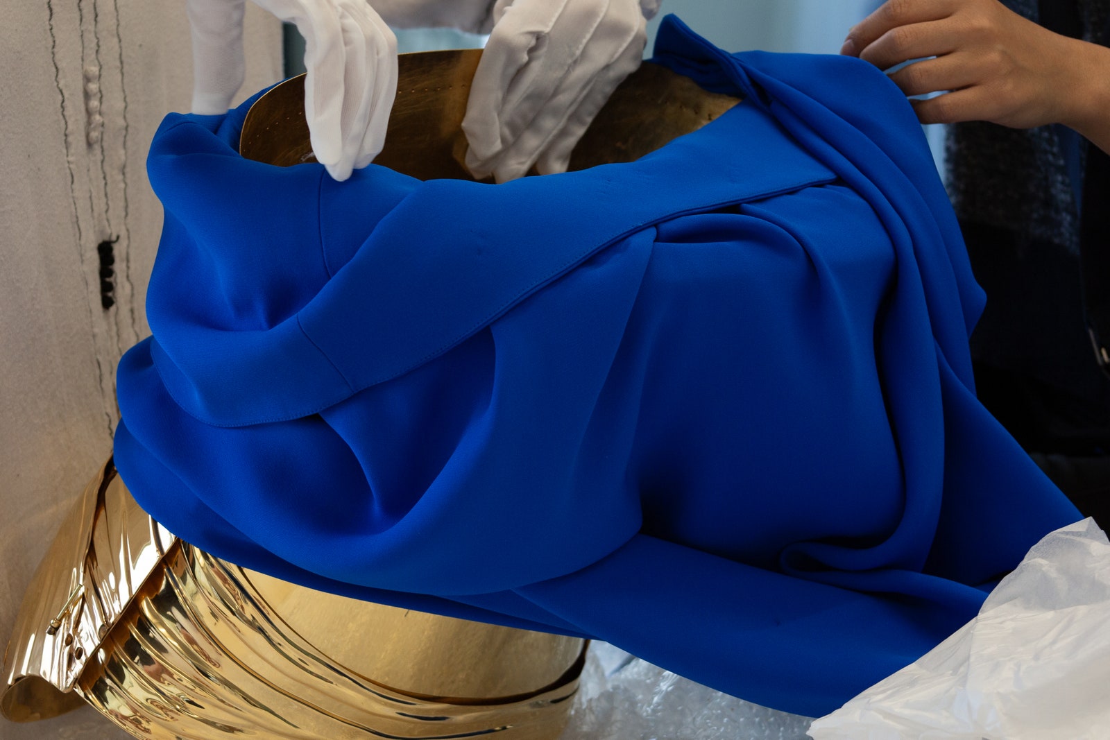 Image may contain Velvet Adult Person Clothing and Dress