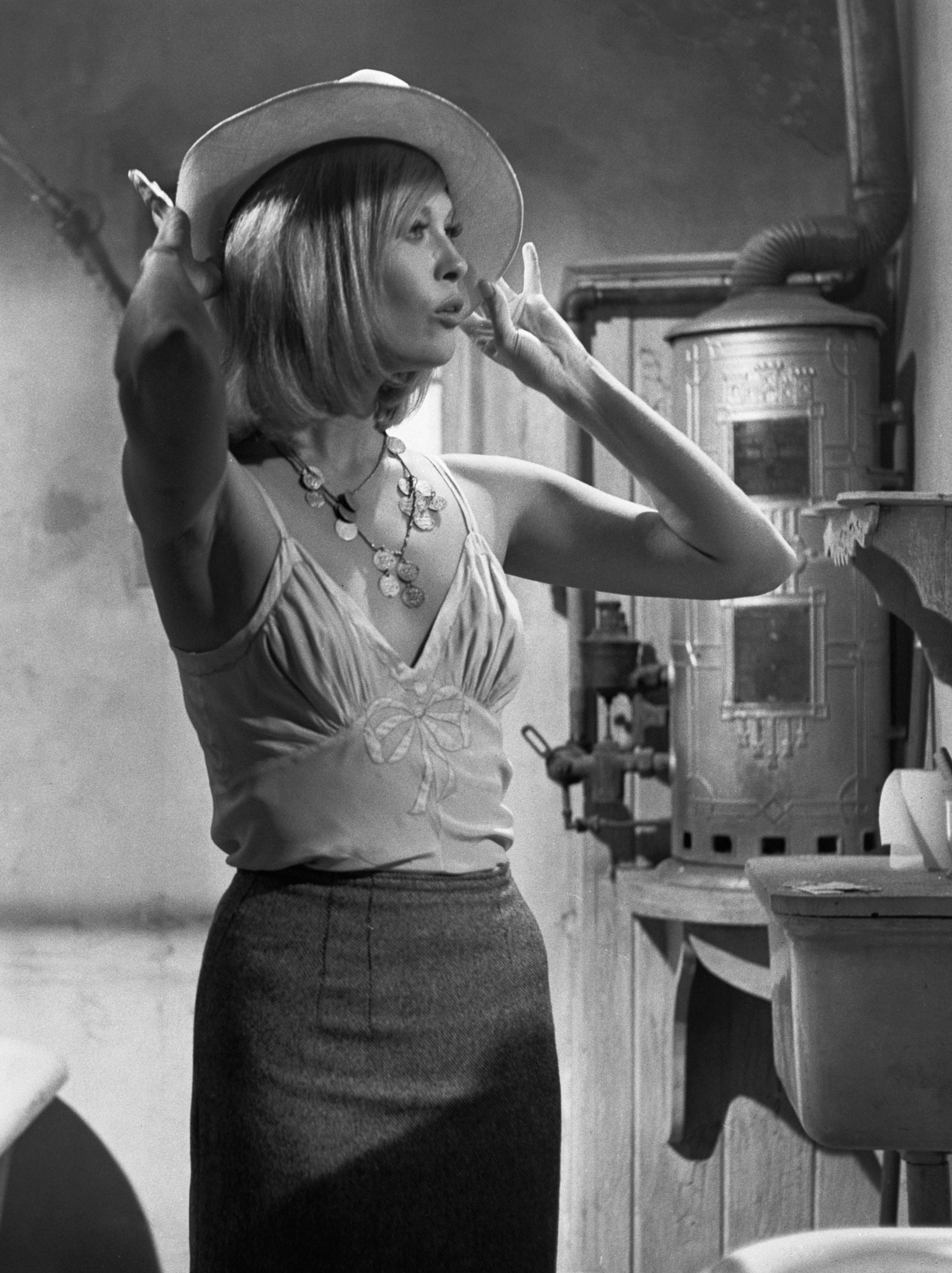 Faye Dunaway con un top lencero