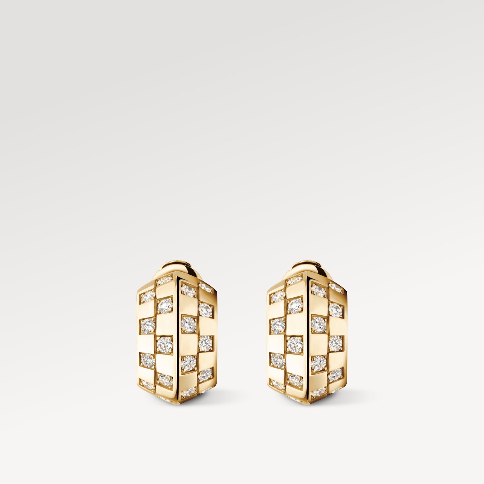 Image may contain Accessories Earring Jewelry Diamond Gemstone Wristwatch and Ring