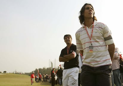 Toni y Rafael, durante un torneo de golf en Shanghái en 2006.