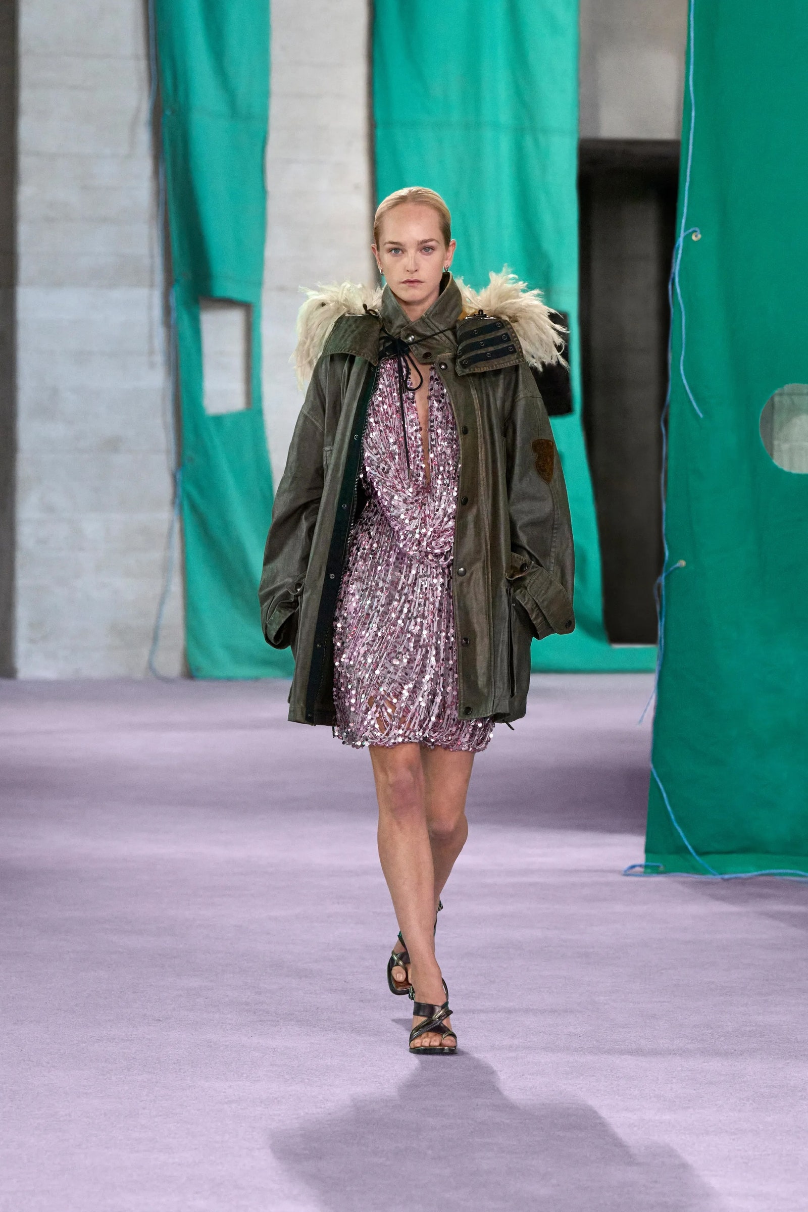 Image may contain Adult Person Fashion Clothing Footwear and Sandal