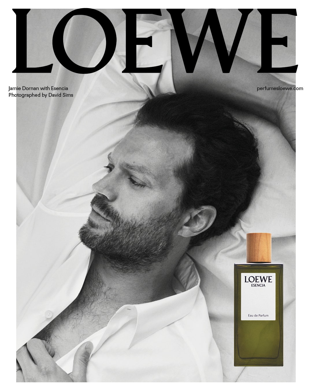 Image may contain Jamie Dornan Publication Adult Person Head Face Bottle Cosmetics Perfume and Magazine