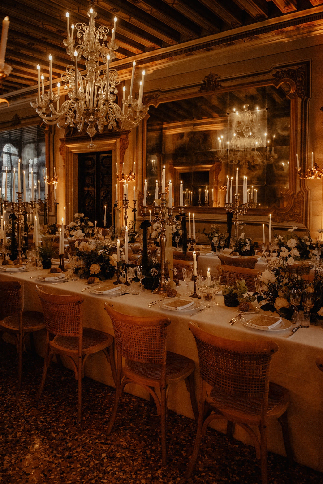 Image may contain Architecture Building Dining Room Dining Table Furniture Indoors Room Table Chandelier and Lamp