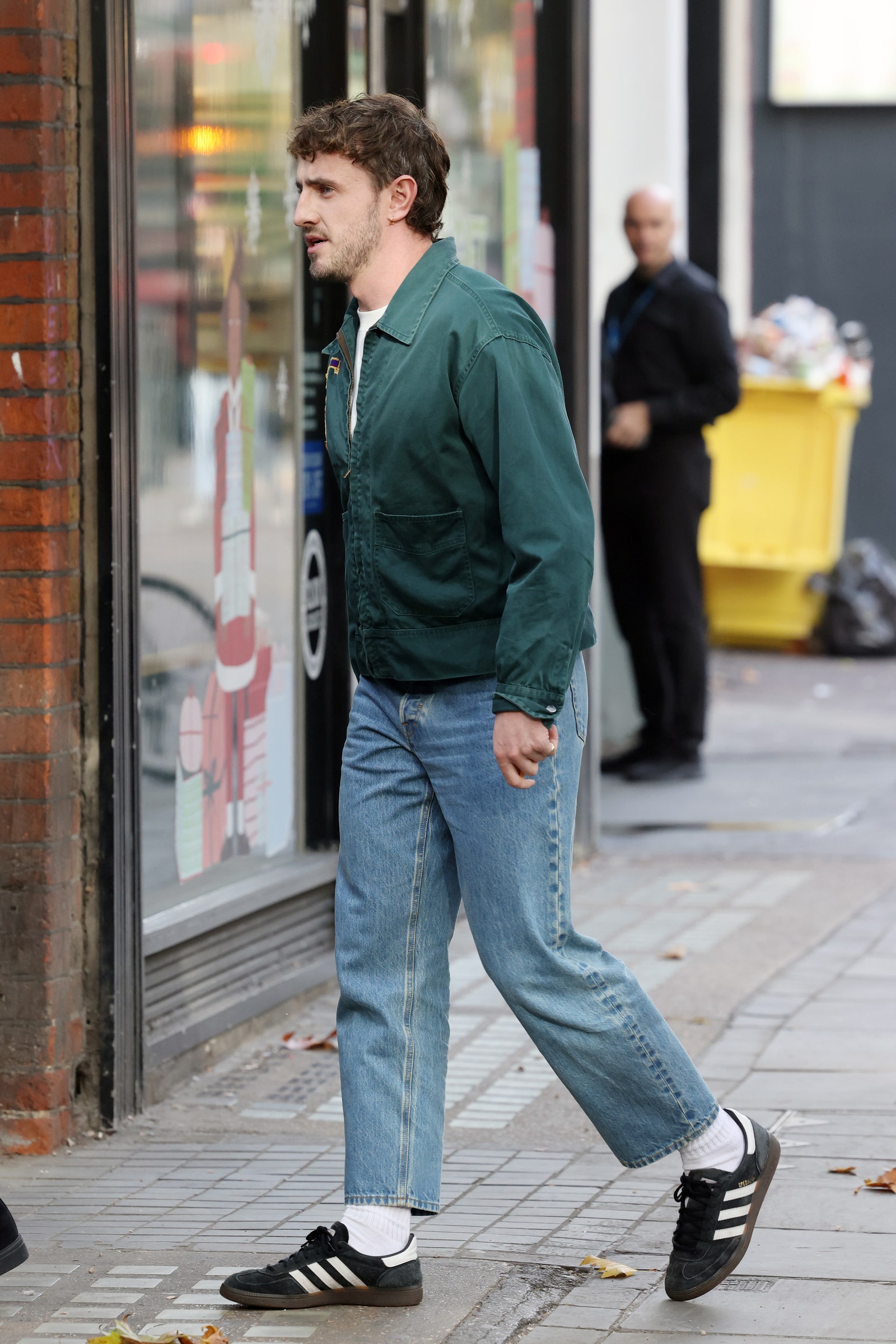 Image may contain Joe Satriani Clothing Pants Jeans Person Teen Footwear Shoe Accessories Bag and Handbag