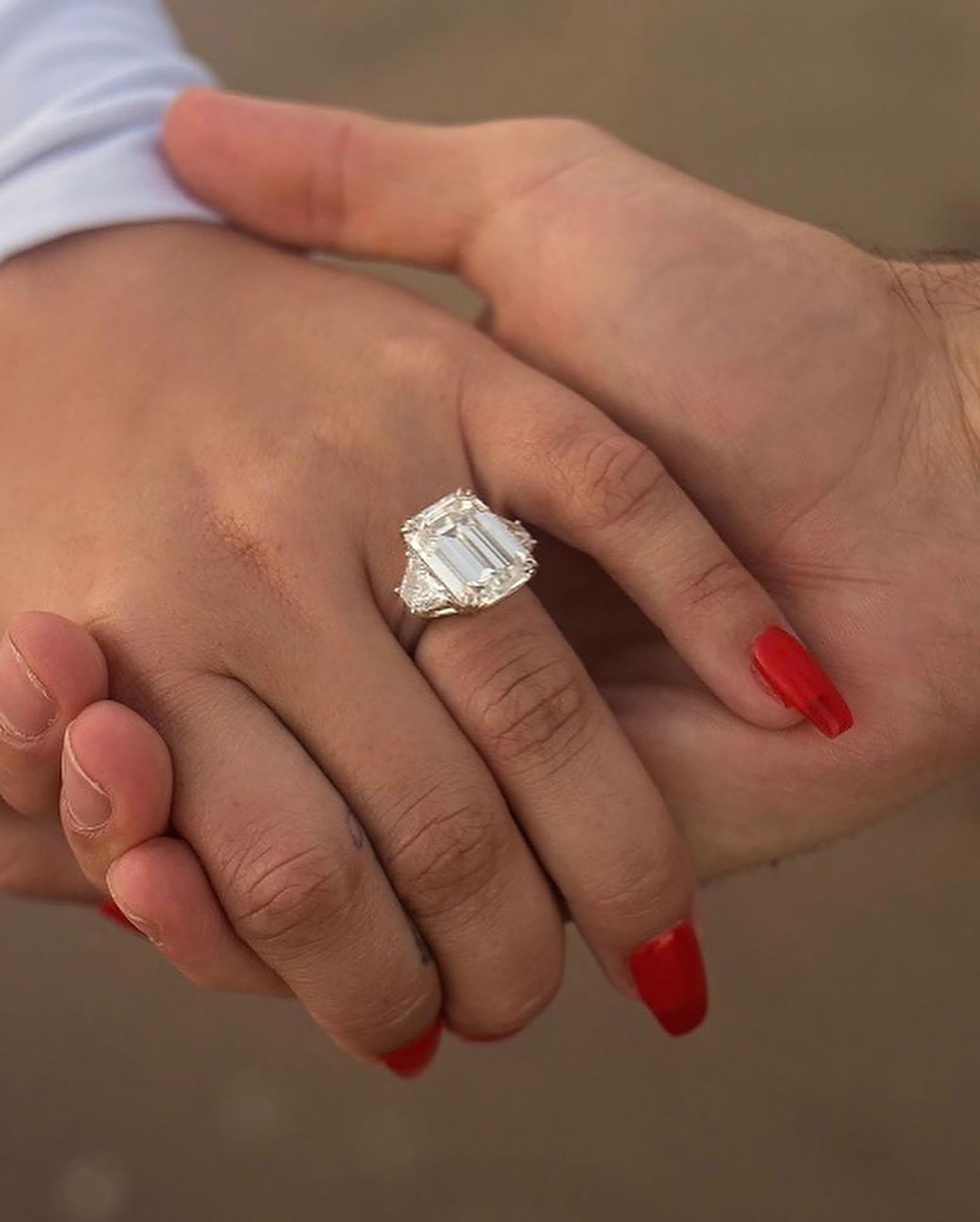 Image may contain Human Person Hand Jewelry Ring Accessories Accessory and Finger