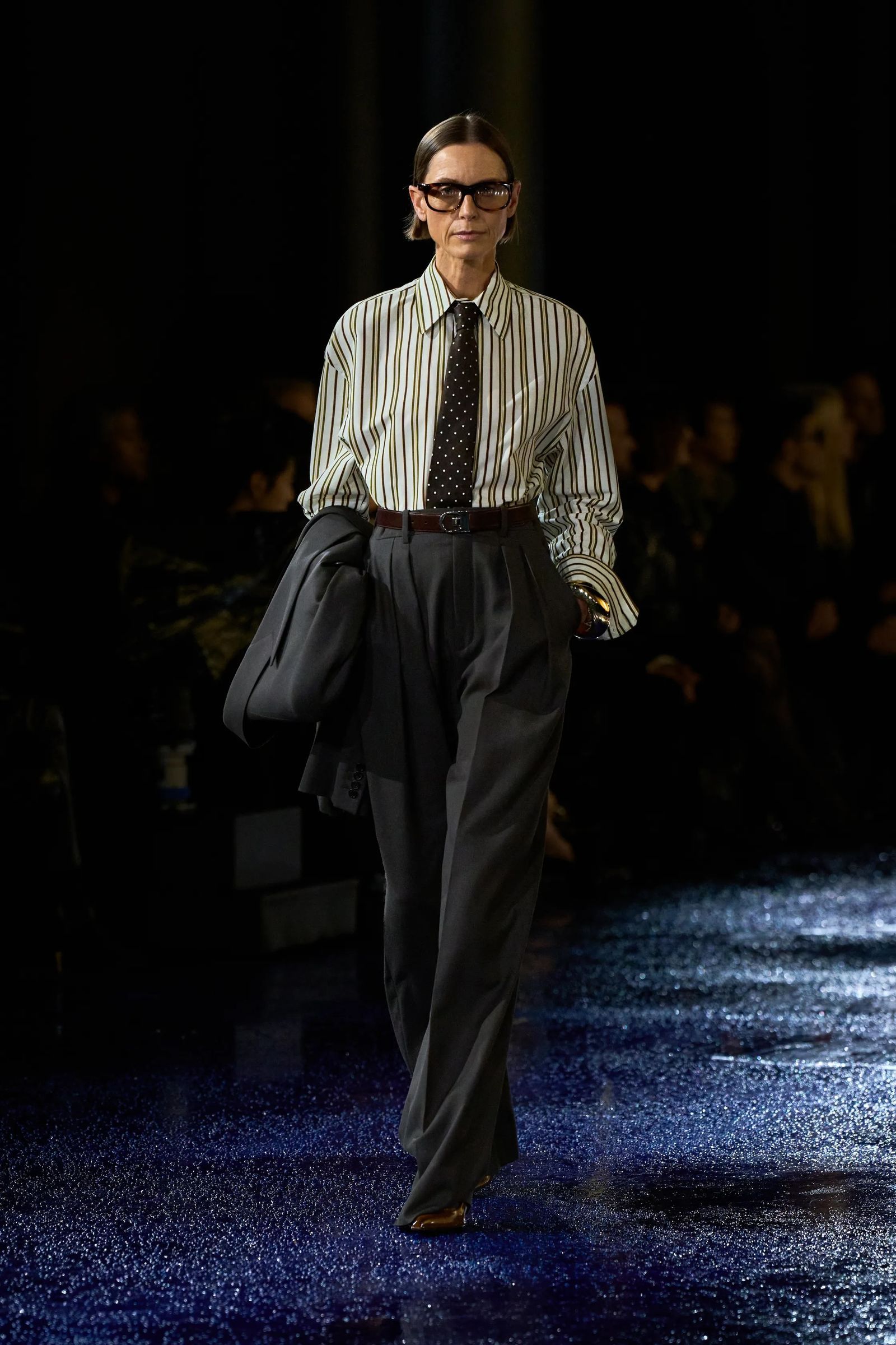 Image may contain Fashion Adult Person Accessories Formal Wear Tie Belt Glasses Bag Handbag Clothing and Footwear