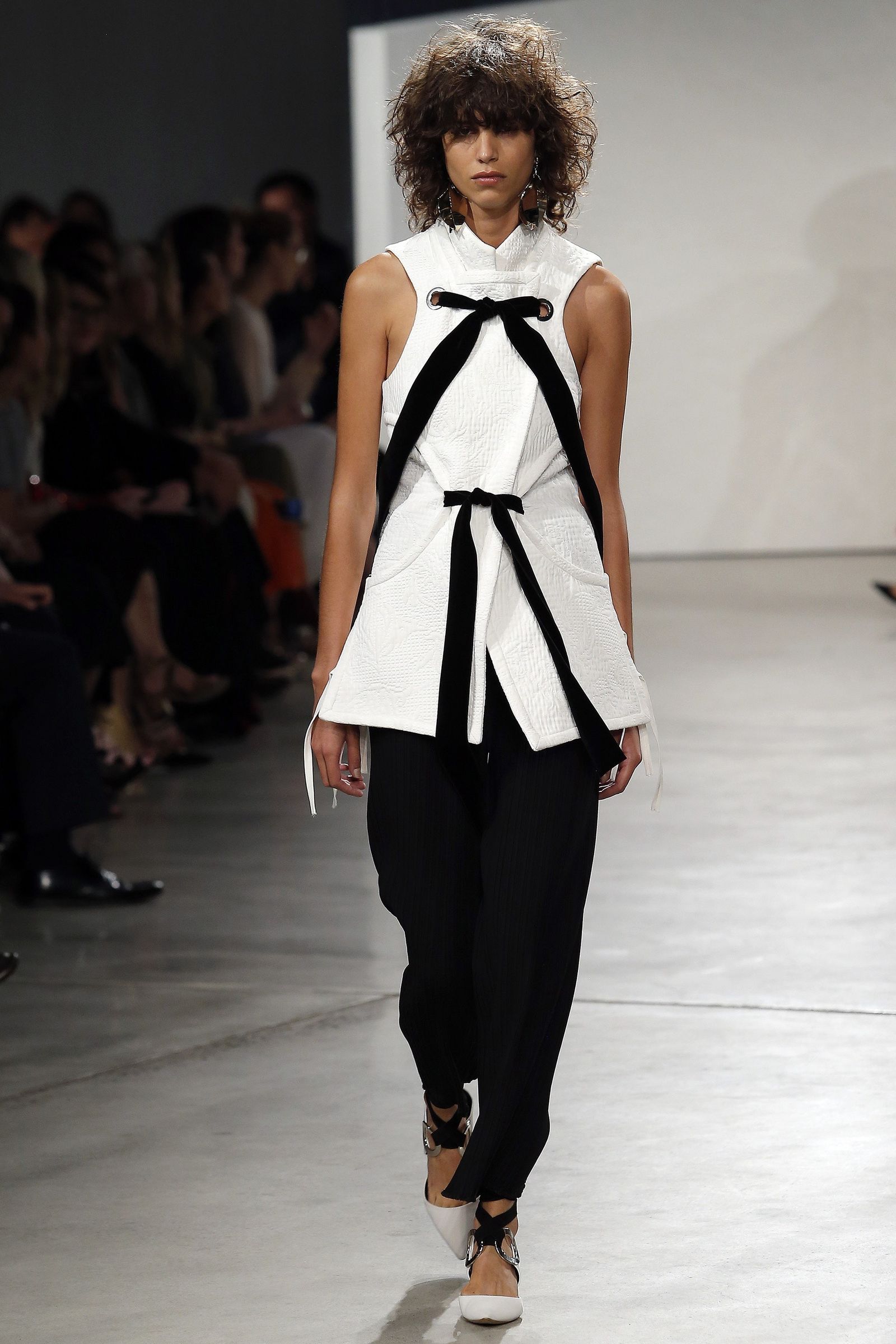 Image may contain Meltem Parlak Fashion Adult Person Runway Clothing Footwear High Heel Shoe and Formal Wear