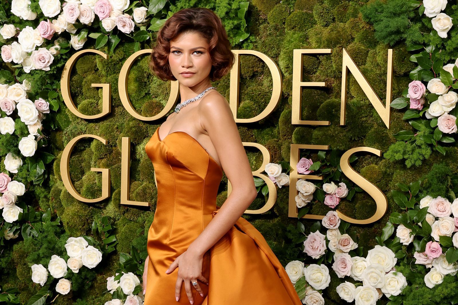 Image may contain: Zendaya, Fashion, Clothing, Dress, Formal Wear, Adult, Person, Wedding, Accessories, Jewelry, and Necklace