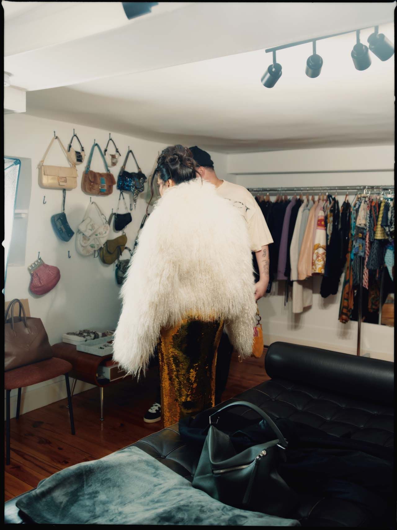Image may contain Dressing Room Indoors Room Accessories Bag Handbag Adult Person Clothing Footwear and Shoe