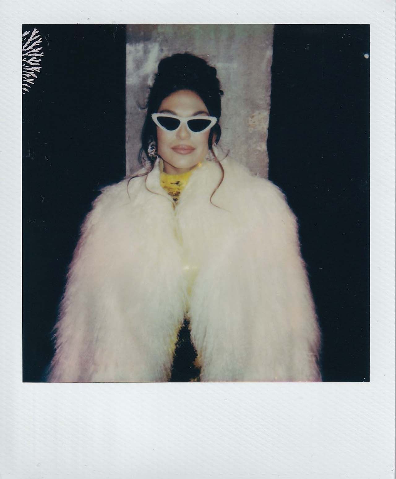 Image may contain Face Head Person Photography Portrait Accessories Sunglasses Clothing Coat Glasses and Adult