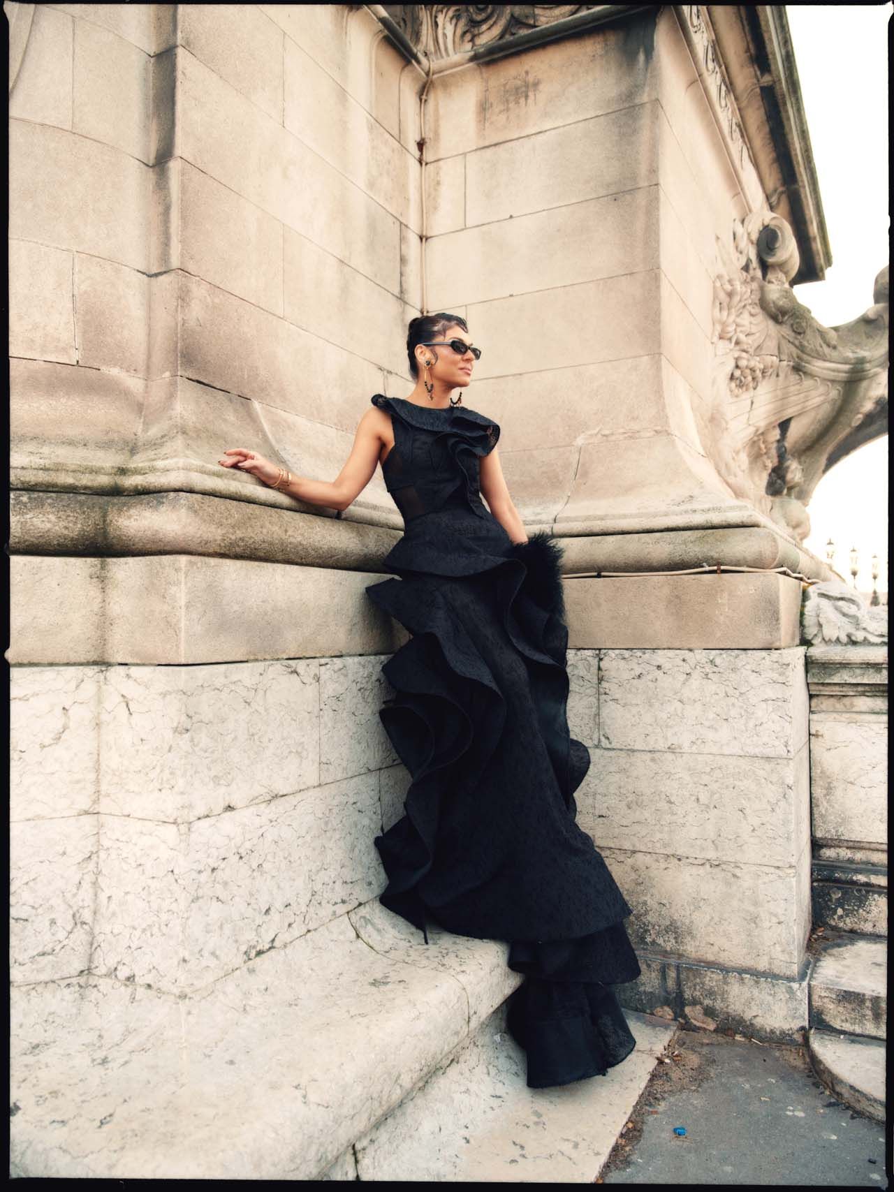 Image may contain Clothing Dress Formal Wear Evening Dress Adult Person Wedding Face Head Photography and Portrait