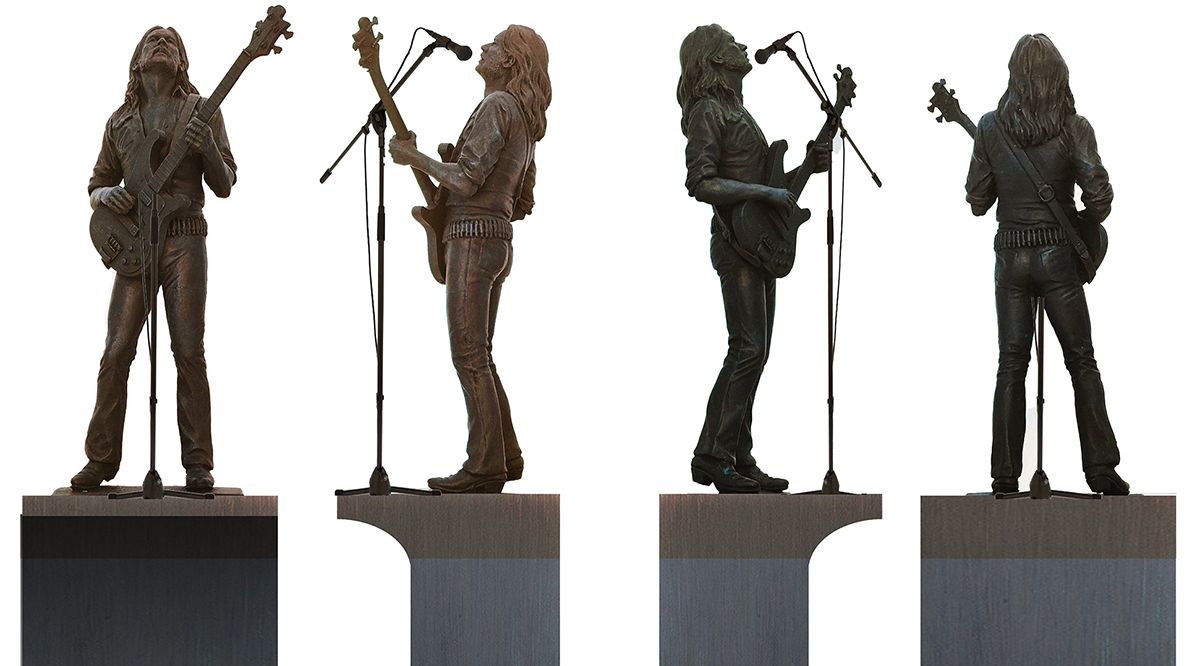 Four mockups of the proposed statue from front, sides and behind