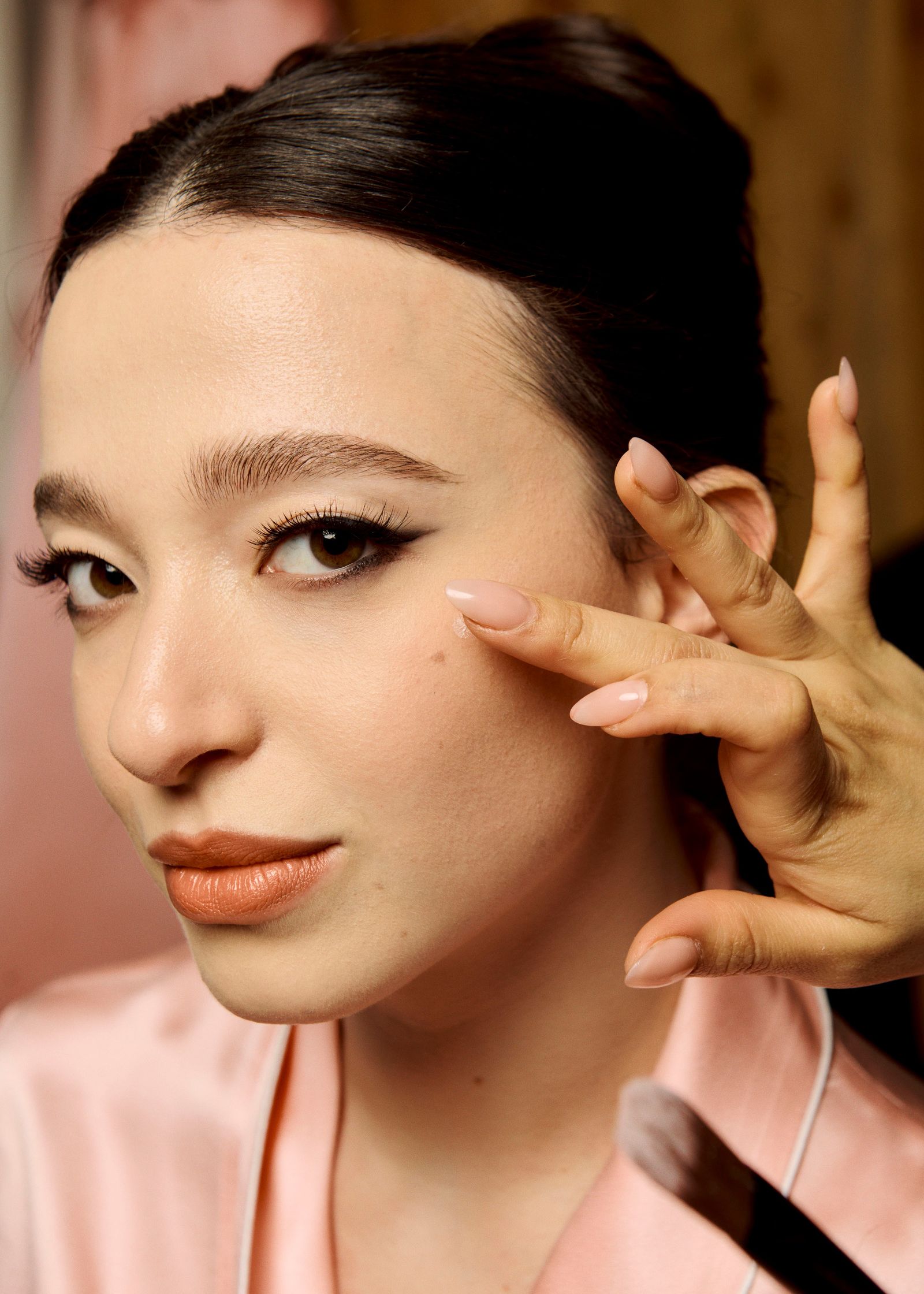 Image may contain Mikey Madison Adult Person Body Part Finger Hand Face and Head