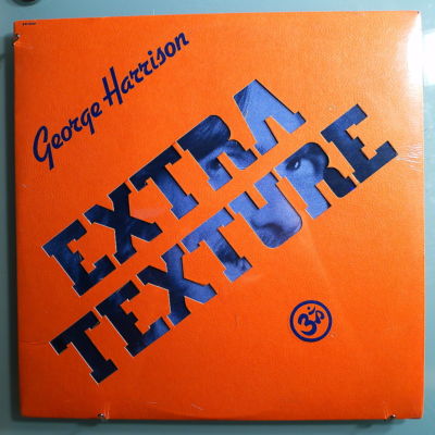 popsike.com - GEORGE HARRISON EXTRA TEXTURE STILL SEALED ORIG 1975 DARK ...