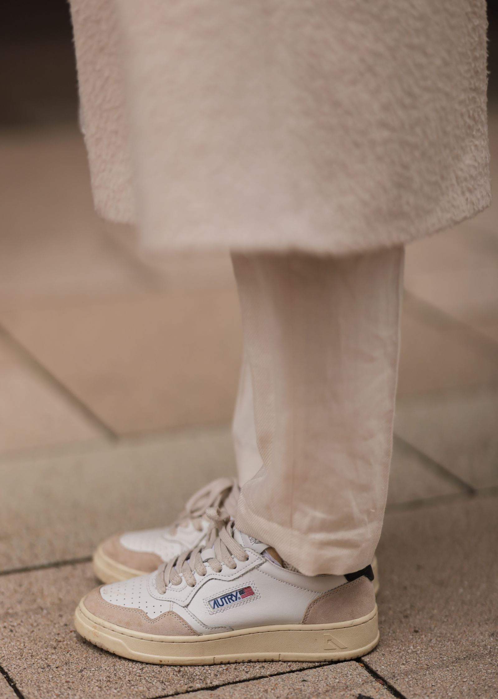 Image may contain Clothing Footwear Shoe Sneaker Person and Walking