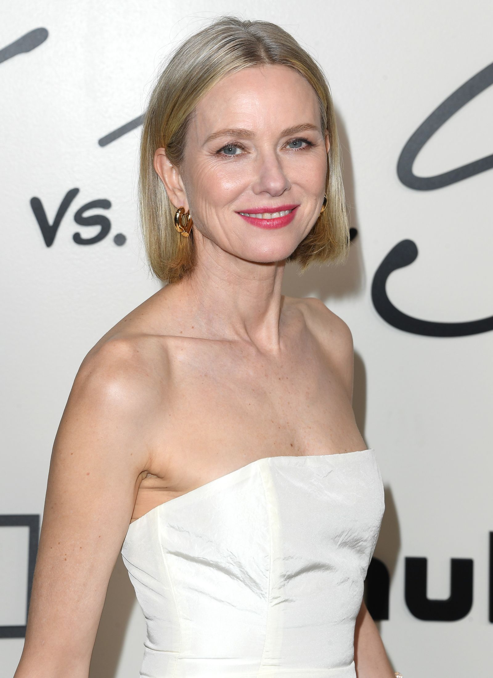 Image may contain Naomi Watts Blonde Hair Person Fashion Adult Wedding Formal Wear Clothing Dress Head and Face