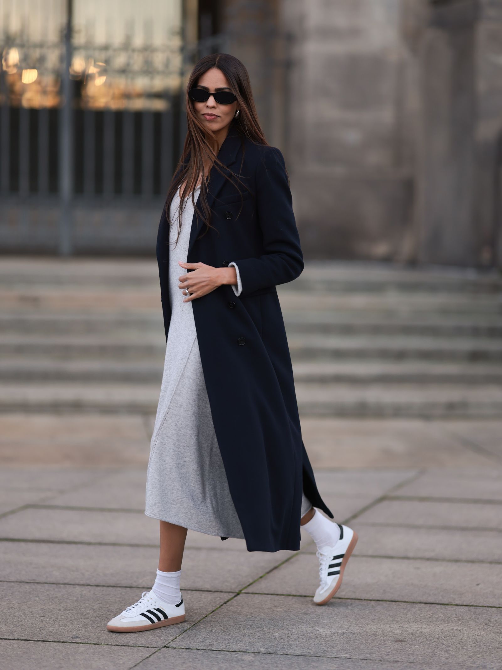 Image may contain Clothing Coat Footwear Shoe Overcoat Pedestrian and Person