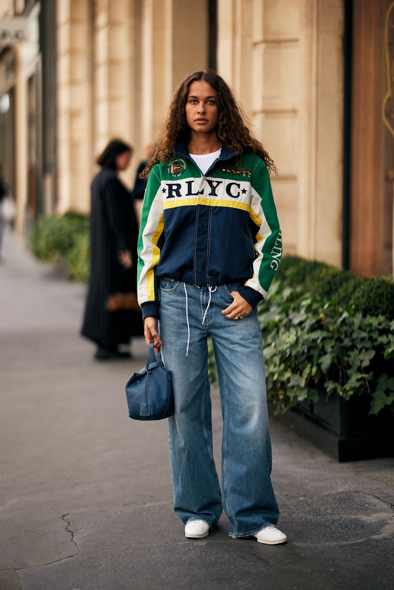 Image may contain Ophlie Meunier Clothing Pants Jeans Adult Person Accessories Bag Handbag Footwear and Shoe