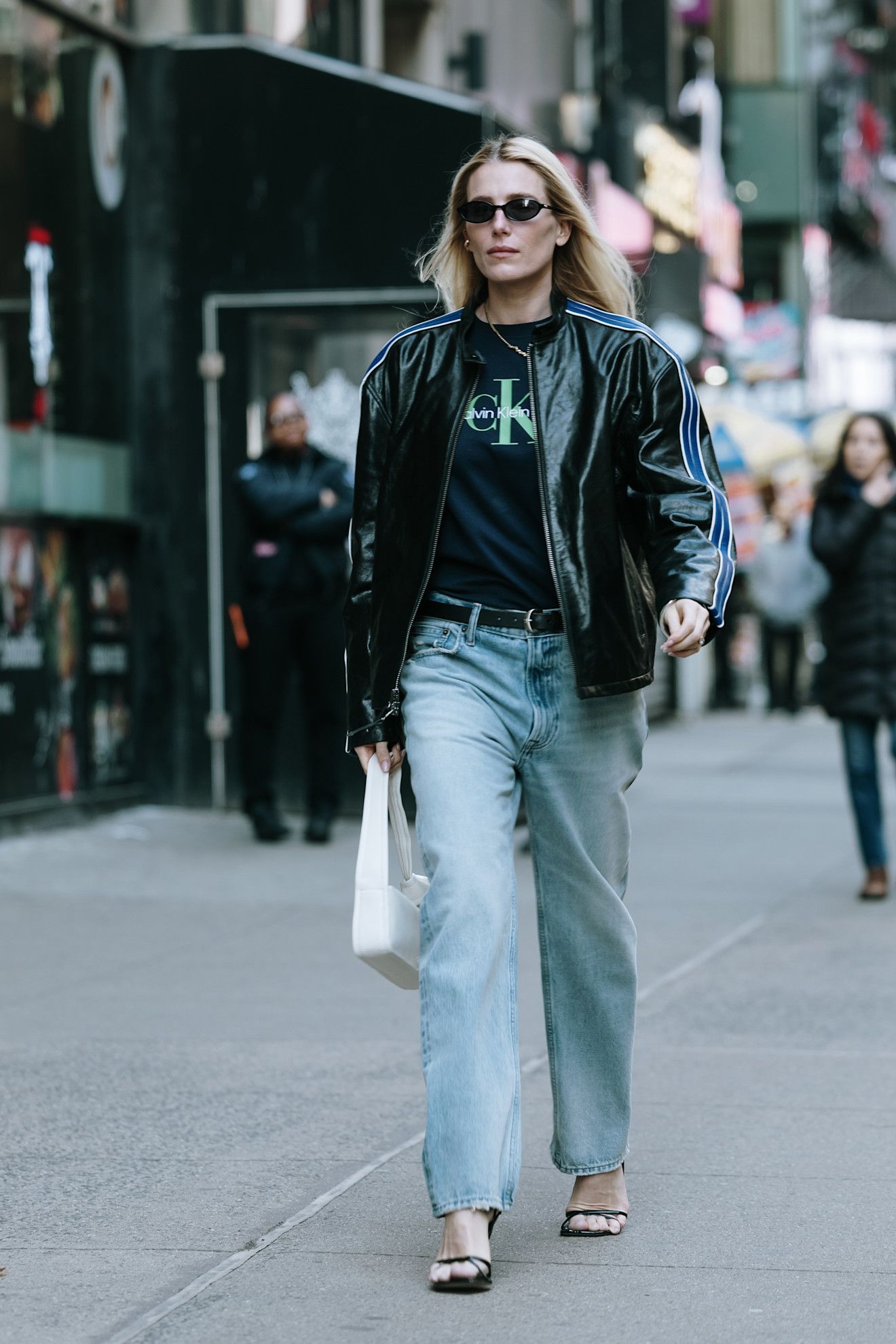 Image may contain Dree Hemingway Walter Jones Clothing Pants Jeans Coat Jacket Accessories Glasses Belt and Adult