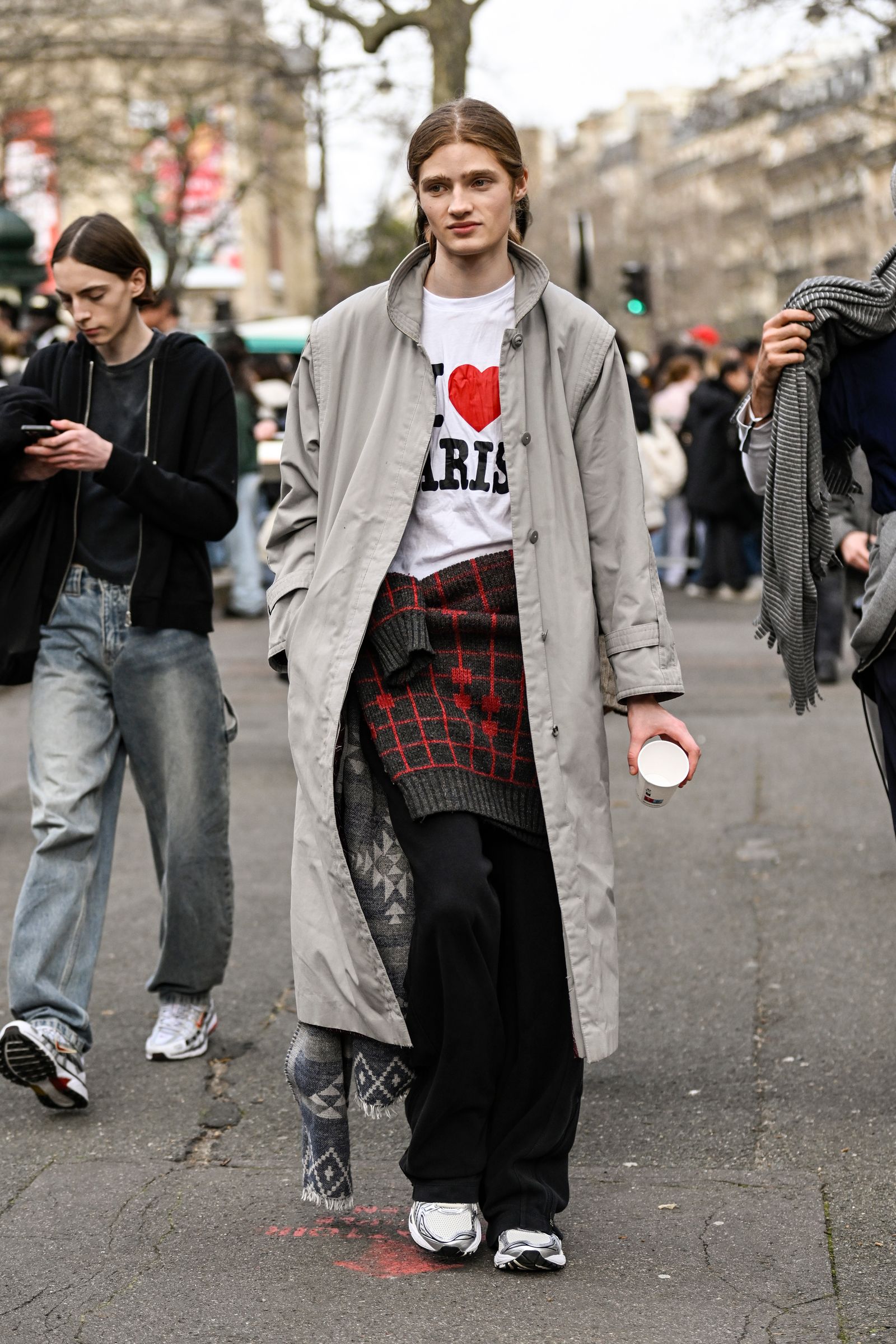 Image may contain Clothing Coat Jacket Person Teen Accessories Bag Handbag Overcoat Pants Footwear and Shoe