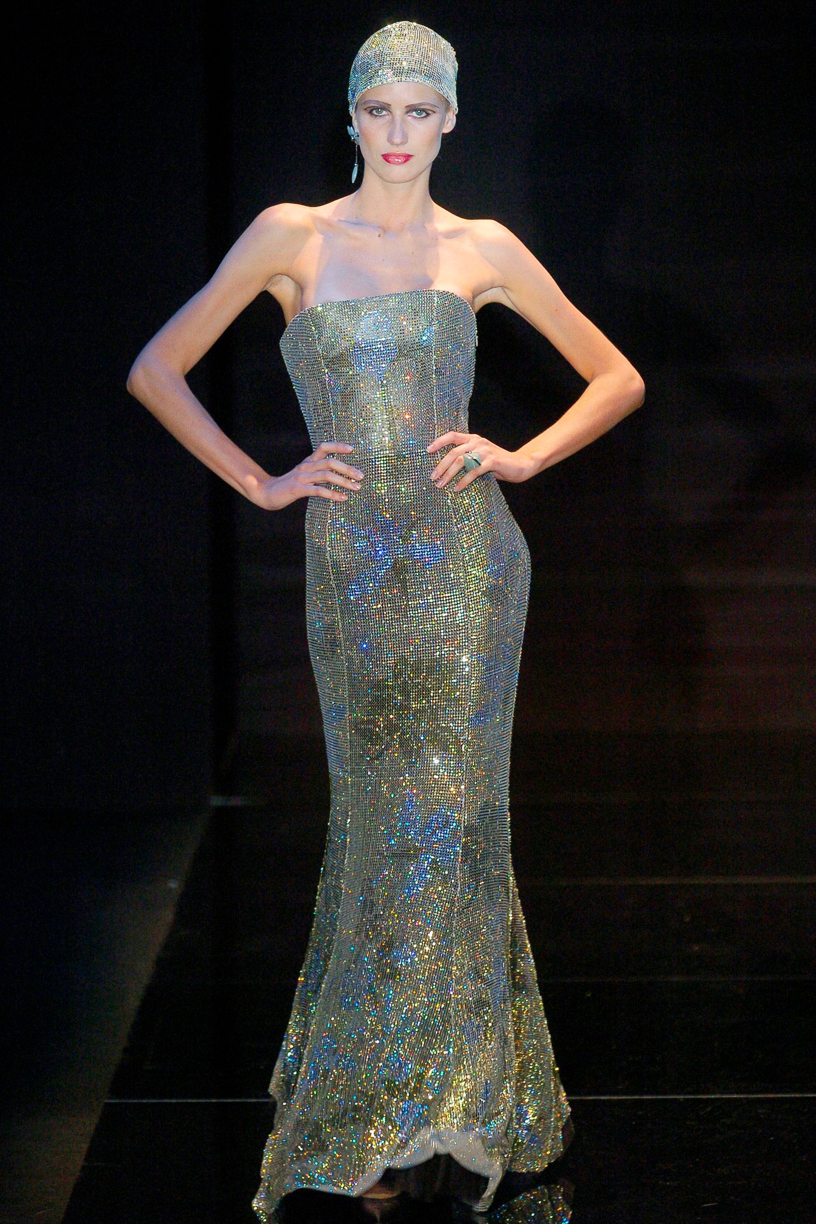 This image may contain Evening Dress Clothing Gown Apparel Robe Fashion Human and Person