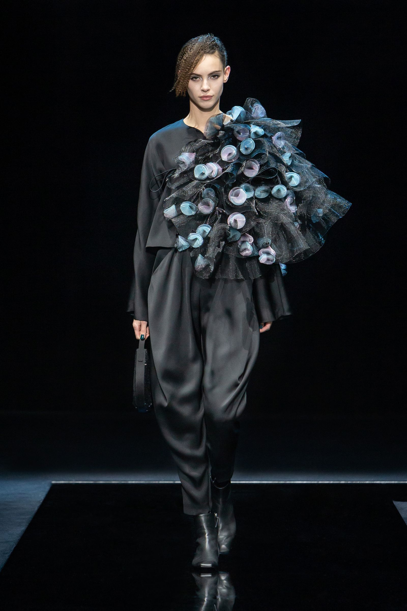 Image may contain Human Person Clothing Apparel Plant Flower Flower Bouquet Flower Arrangement Blossom and Suit