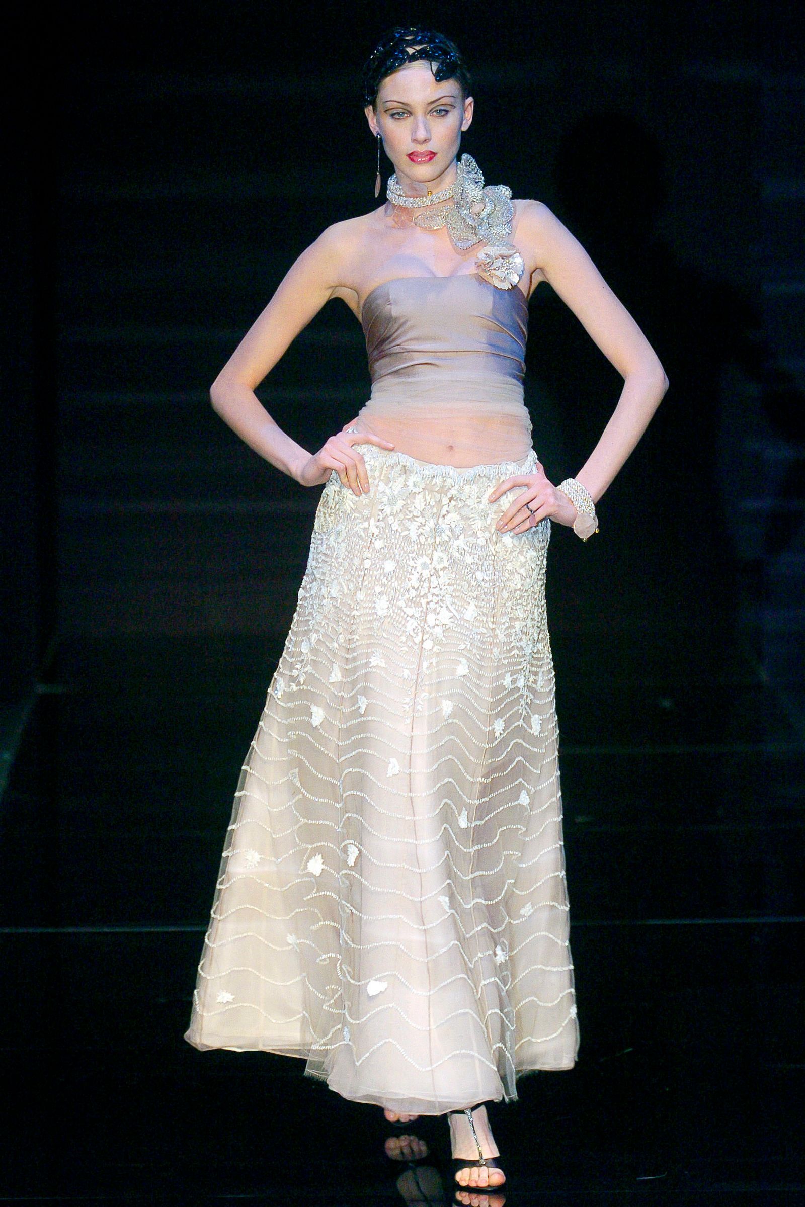 This image may contain Clothing Apparel Evening Dress Fashion Gown Robe Human and Person