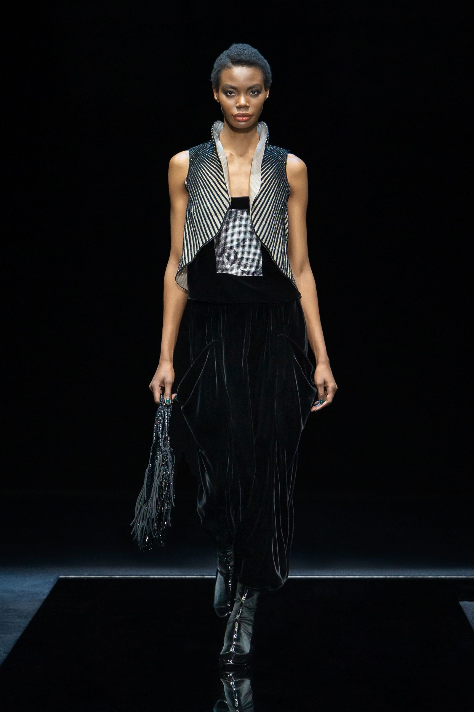 Image may contain Human Person Clothing Apparel Evening Dress Gown Robe Fashion and Runway