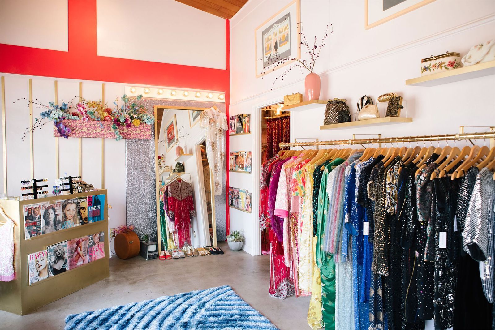 This image may contain Boutique Shop Indoors Furniture Room Interior Design and Rug