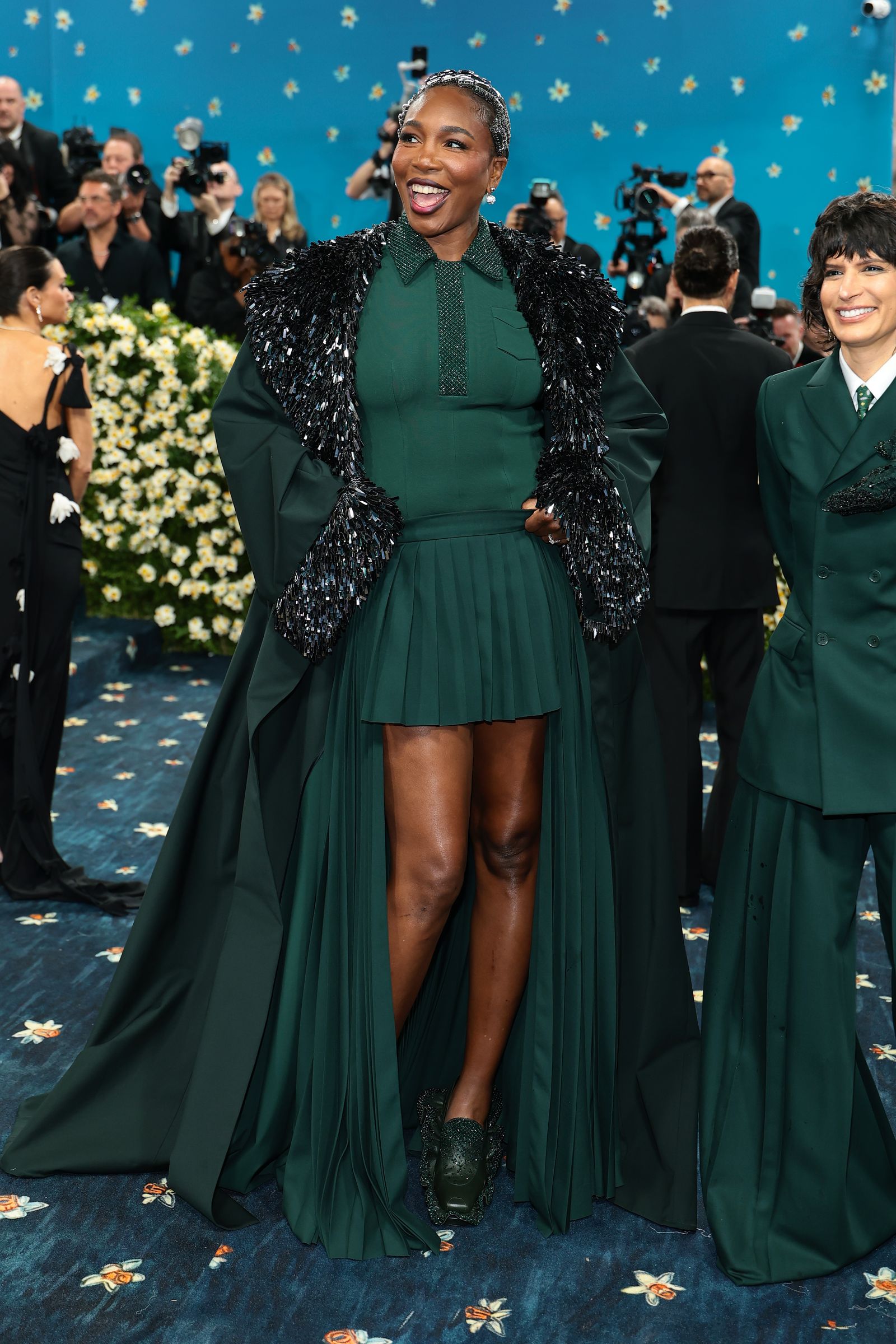 Image may contain Venus Williams Adult Person Wedding Face Head Clothing Coat and Happy
