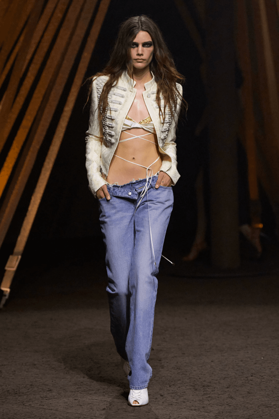 Image may contain Clothing Pants Fashion Jeans Coat Jacket Long Sleeve Sleeve Adult Person Blouse Face and Head