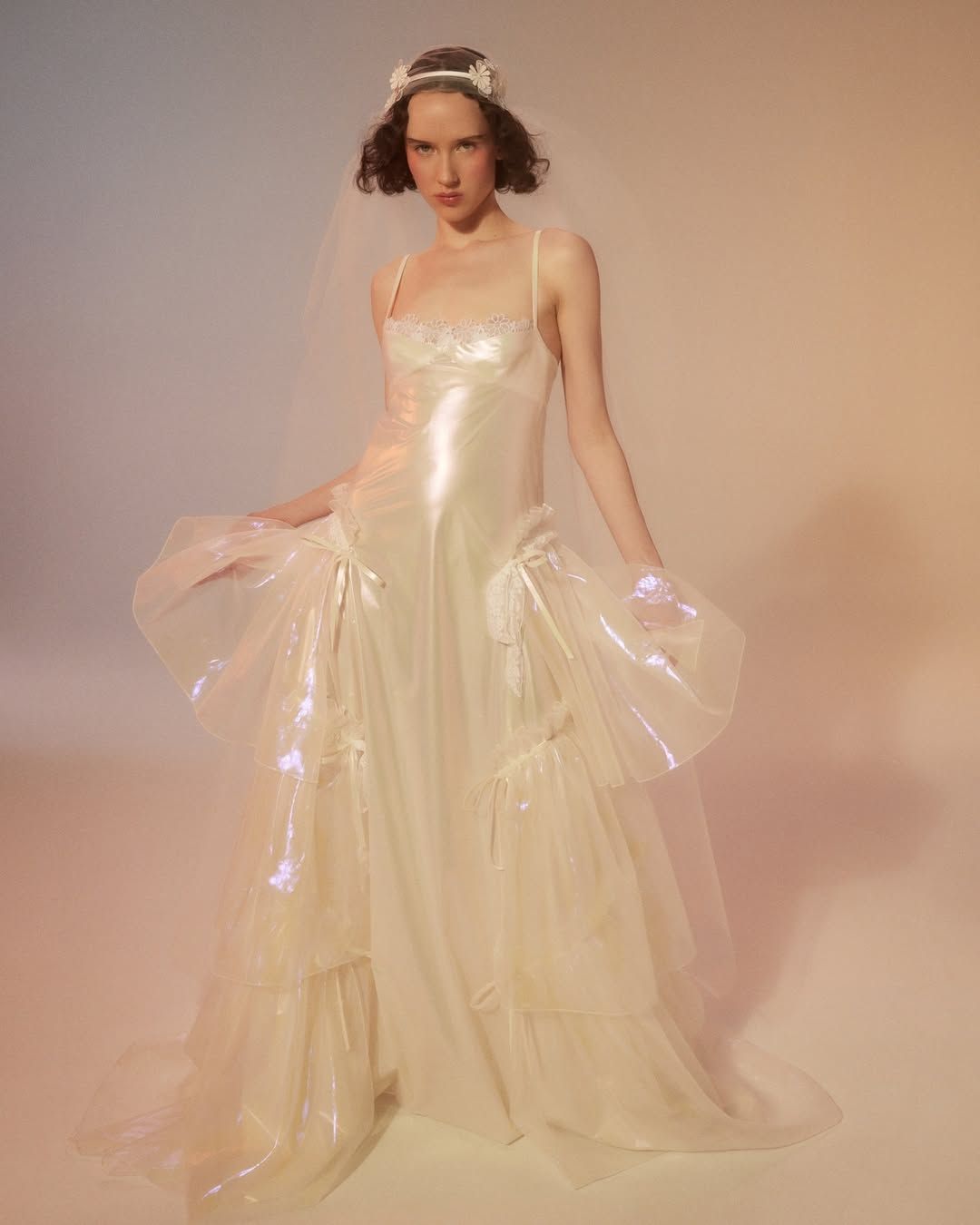 Image may contain Clothing Dress Fashion Formal Wear Gown Wedding Wedding Gown Adult and Person