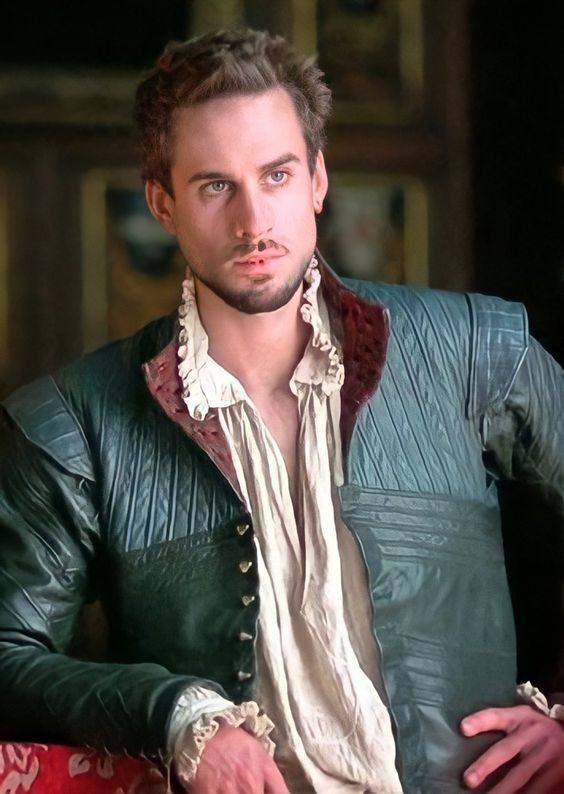 Image may contain Joseph Fiennes Clothing Coat Jacket Face Head Person Photography Portrait Adult Blonde and Hair