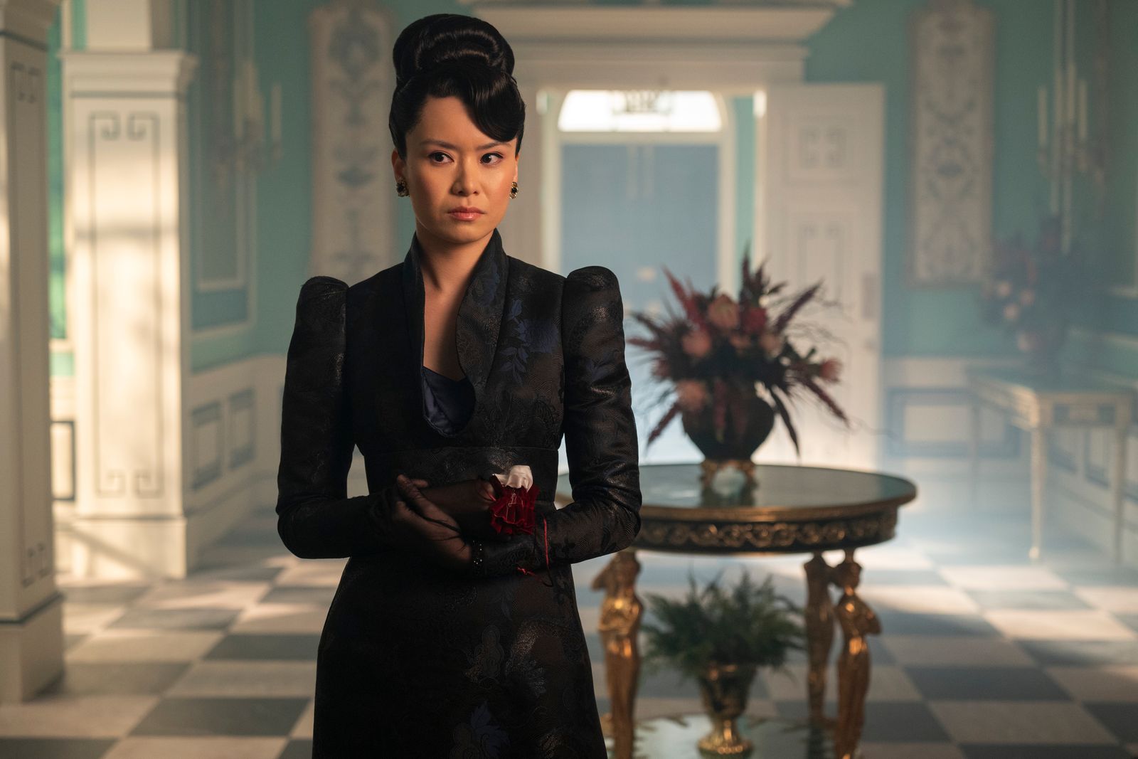 Image may contain Katie Leung Black Hair Hair Person Adult Formal Wear Plant Clothing Suit Head and Face