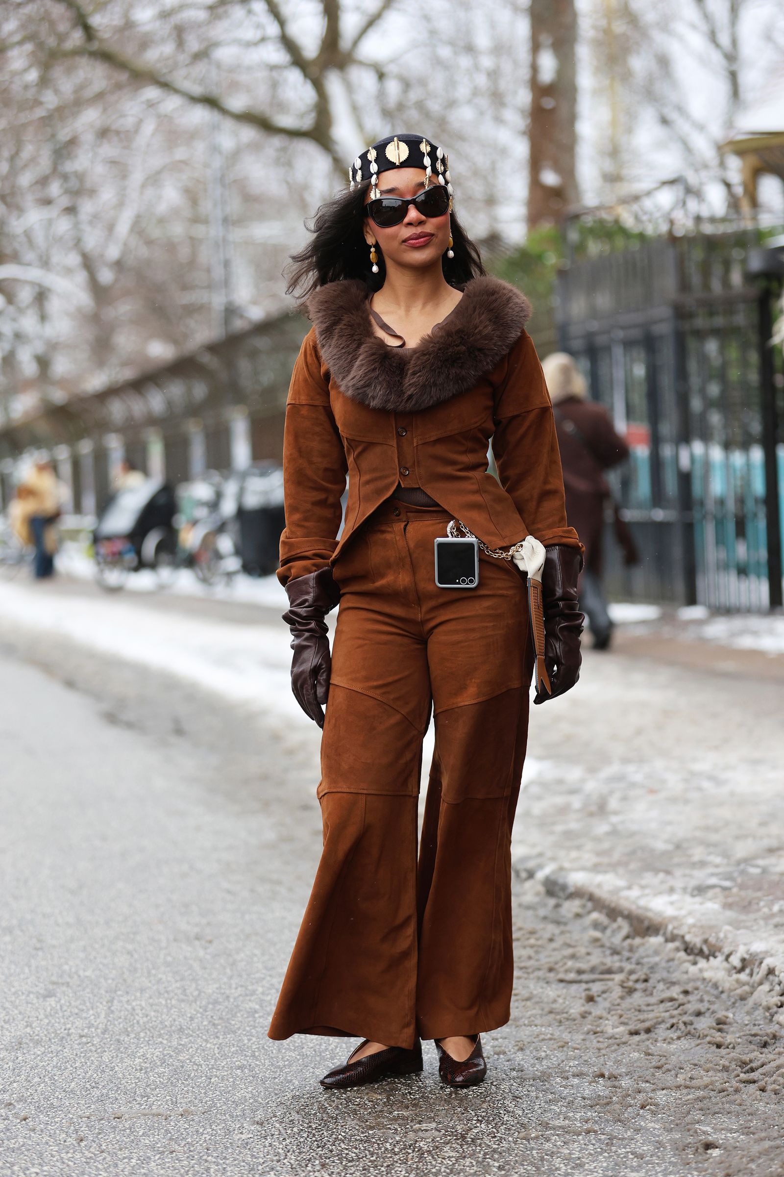 Image may contain Clothing Pants Coat Long Sleeve Sleeve Jeans Jacket Adult and Person