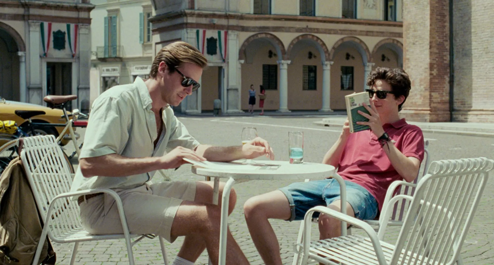 Image may contain Armie Hammer Dining Table Furniture Table Accessories Sunglasses Person Sitting Face and Head
