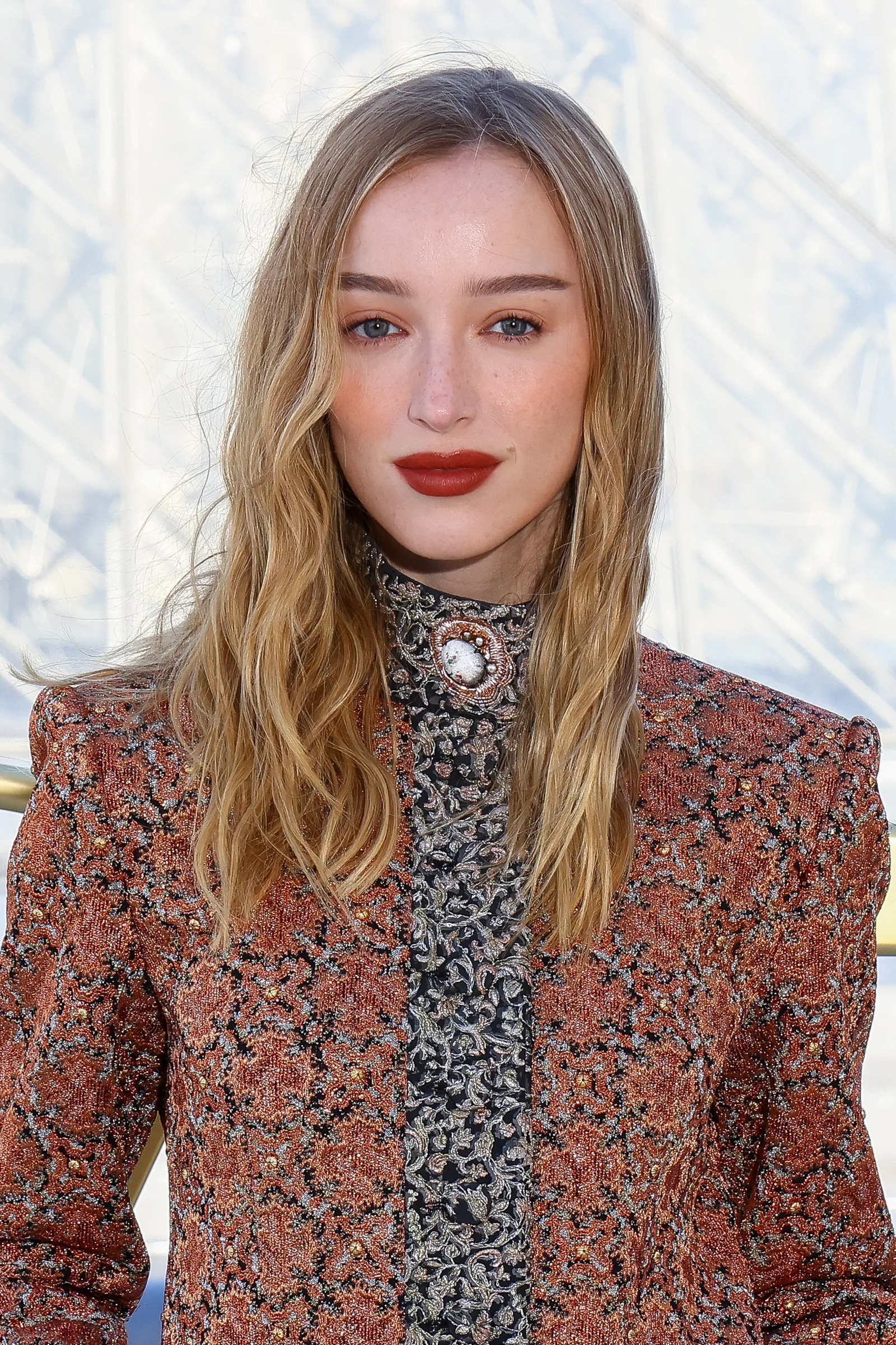 Image may contain Blonde Hair Person Adult Face Head Photography and Portrait