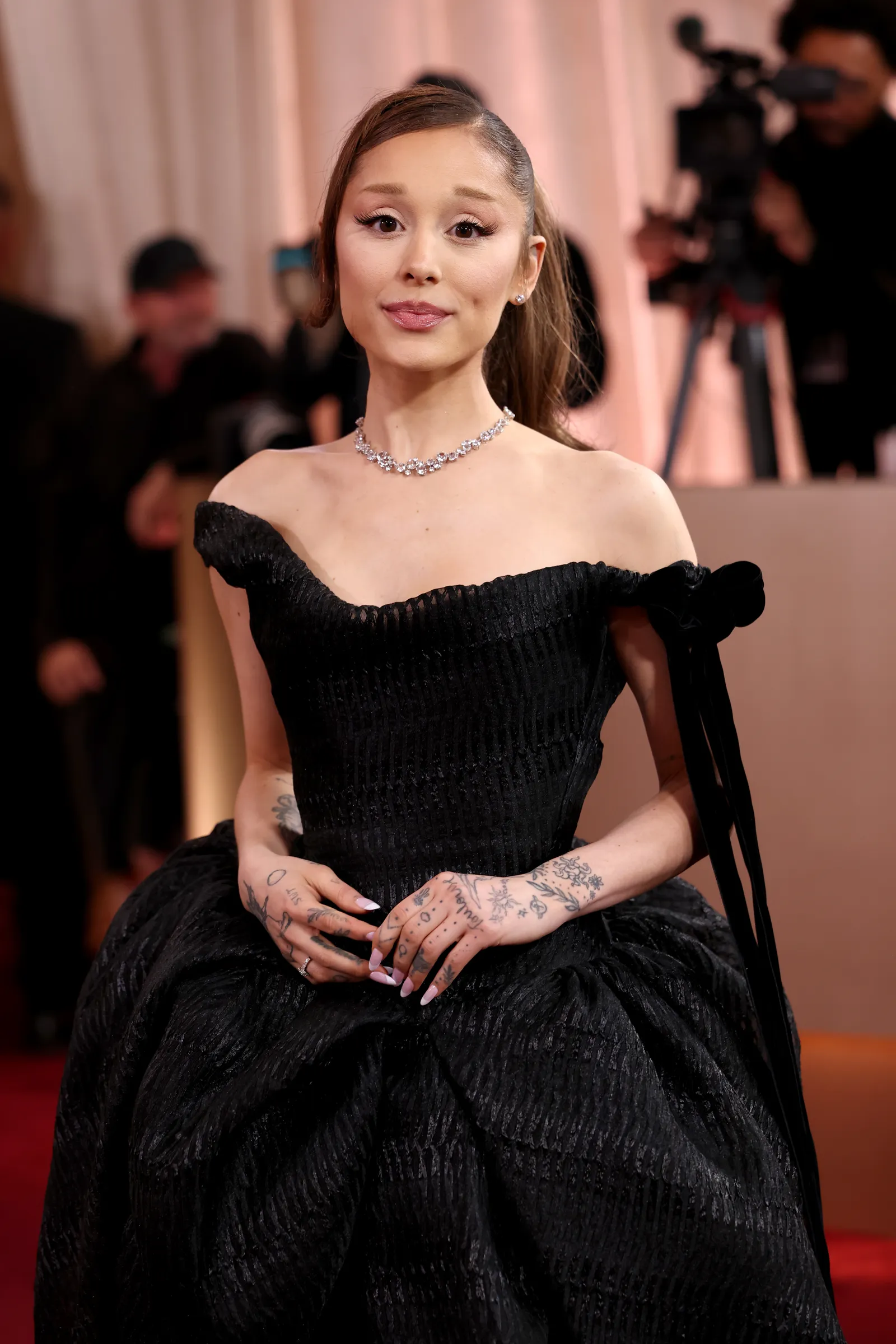 Image may contain Ariana Grande Clothing Dress Formal Wear Evening Dress Adult Person Wedding and Fashion