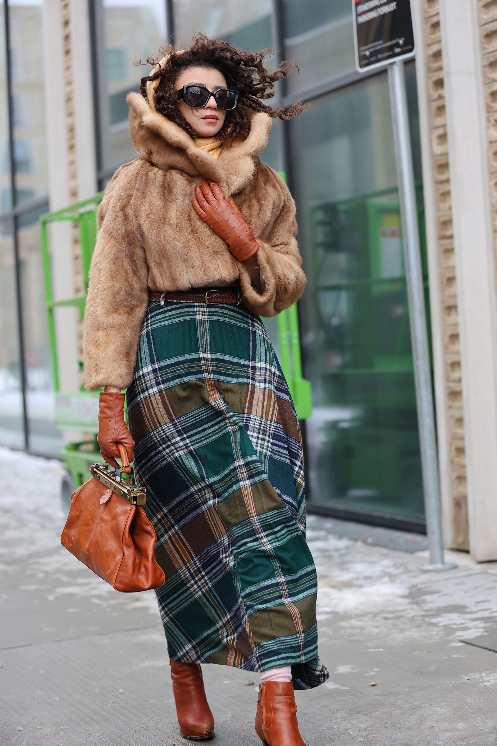 Image may contain Clothing Pants Adult Person Glove and Coat