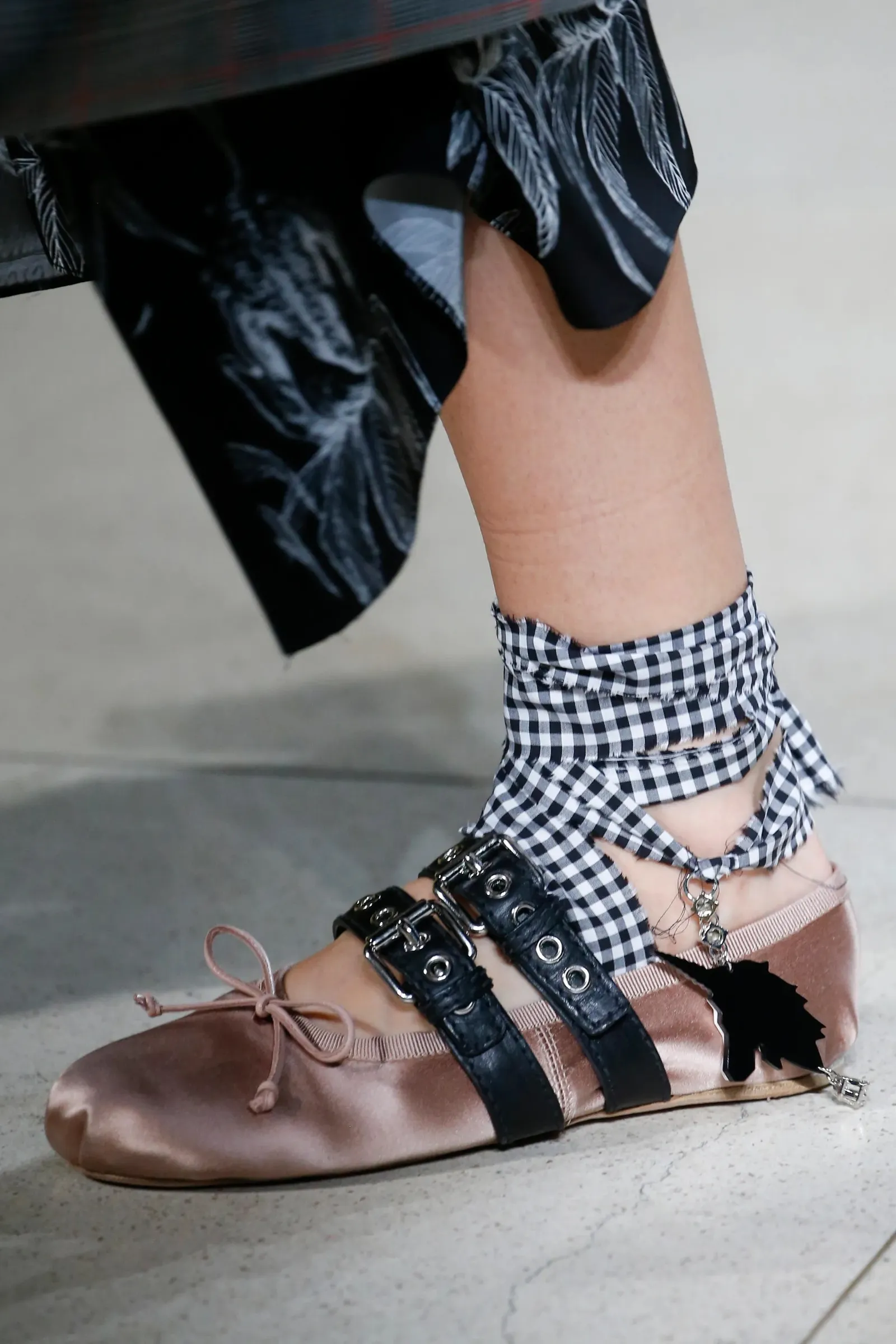 Image may contain Clothing Footwear Shoe Sandal Sneaker High Heel and Person