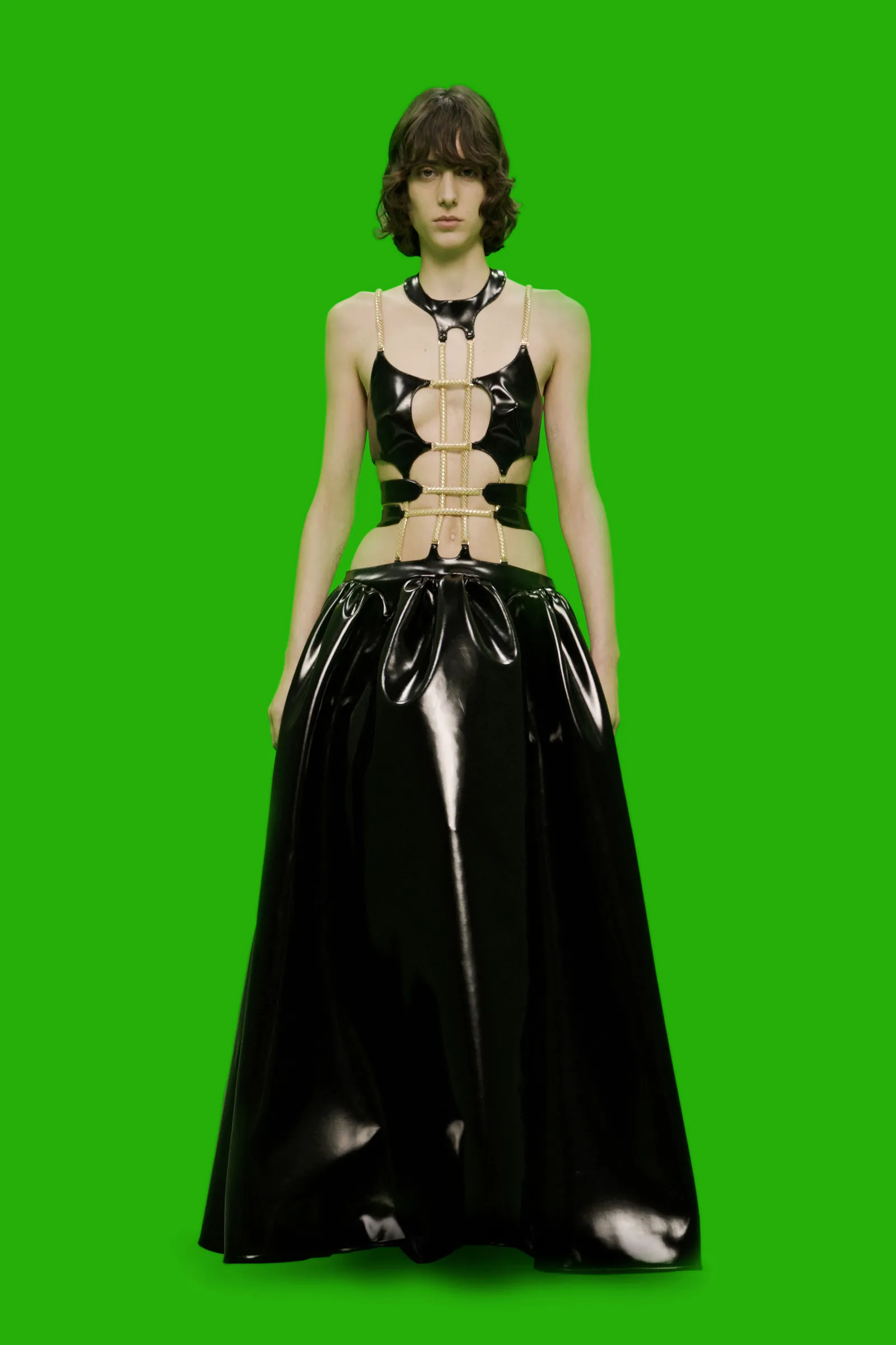Image may contain Human Person Latex Clothing Clothing Apparel Costume and Spandex