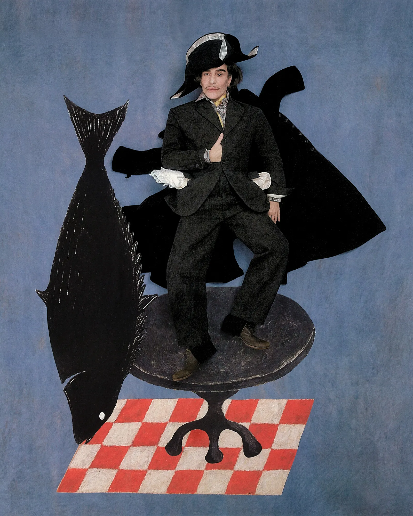 Image may contain John Galliano Clothing Coat Adult Person Animal Fish and Sea Life