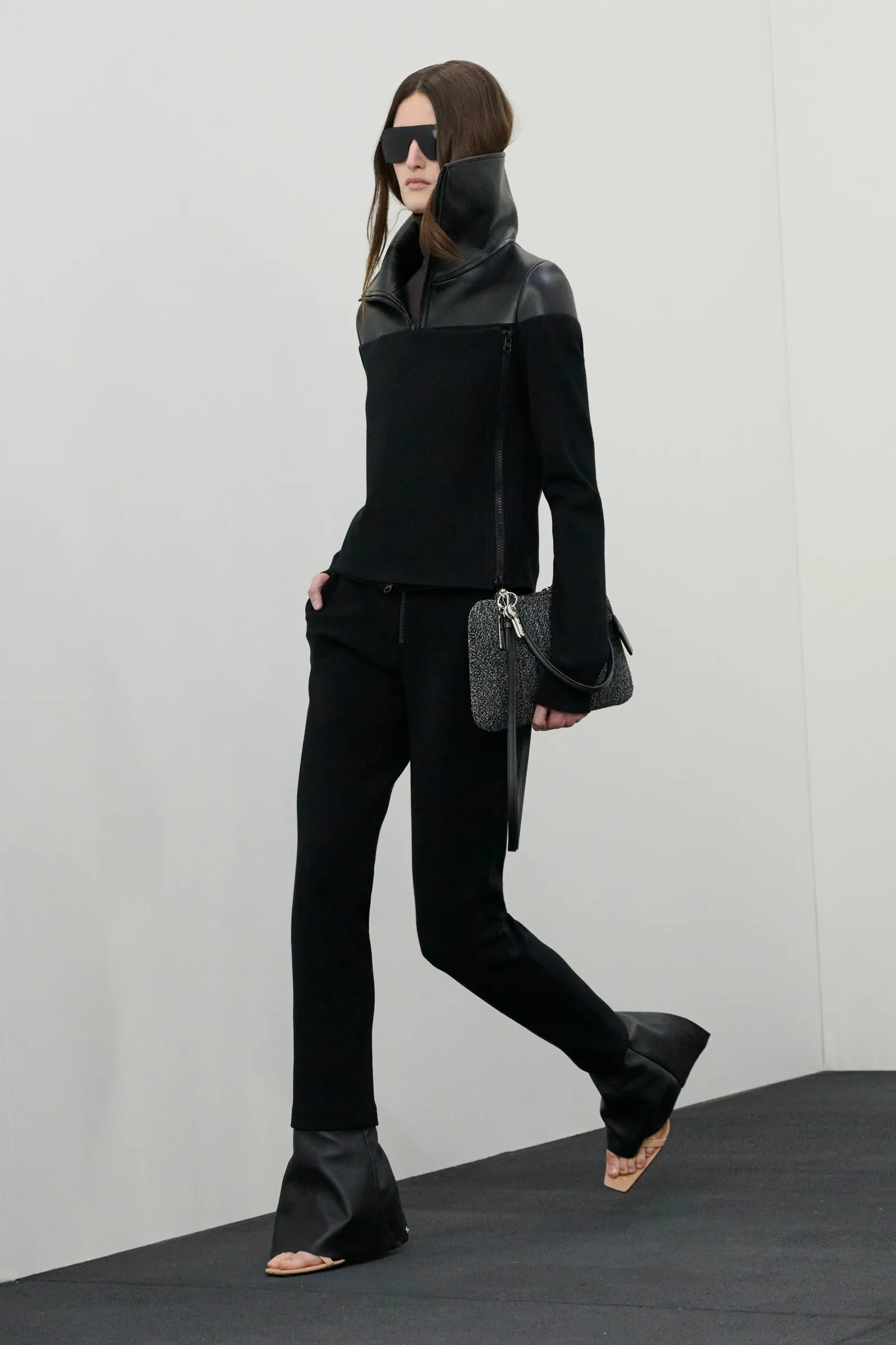 Image may contain Diana Dondoe Clothing Coat Jacket Pants Formal Wear Suit Footwear Shoe Long Sleeve and Sleeve