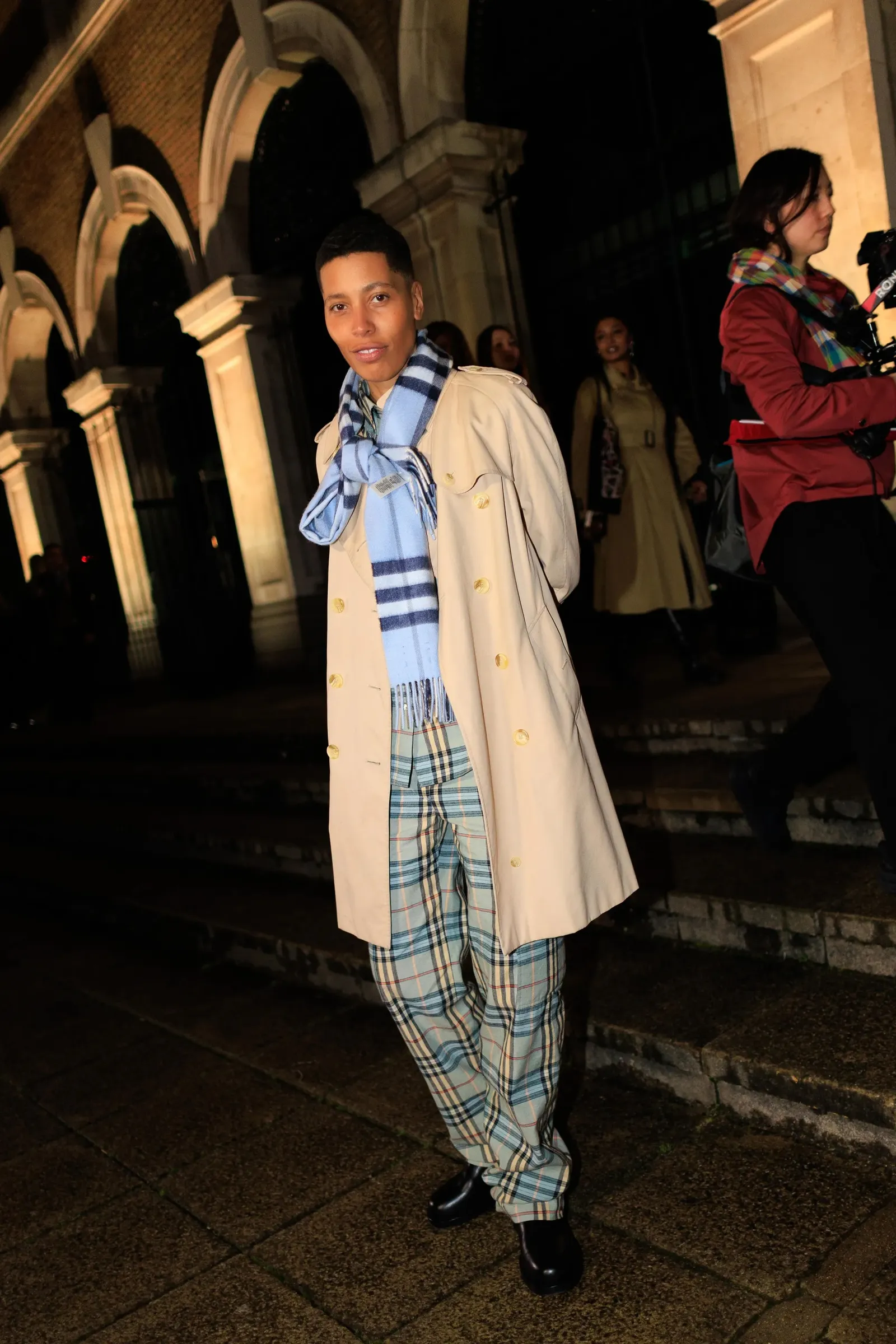 Image may contain Clothing Coat Adult Person Pants Face Head Photography Portrait and Urban