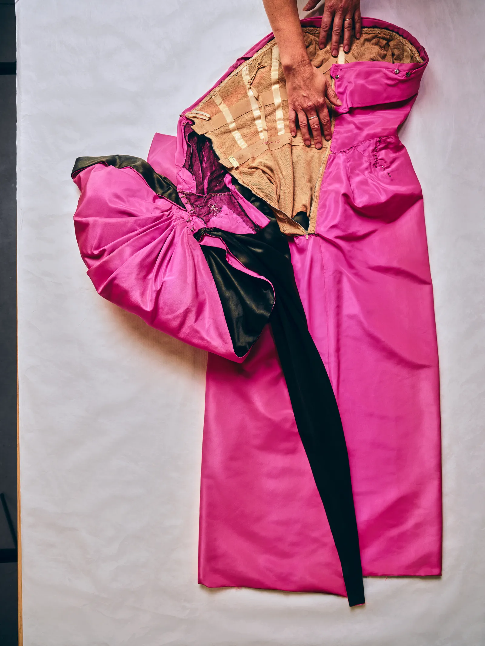Image may contain Clothing Dress Fashion Formal Wear Adult Person Gown Coat Velvet and Robe