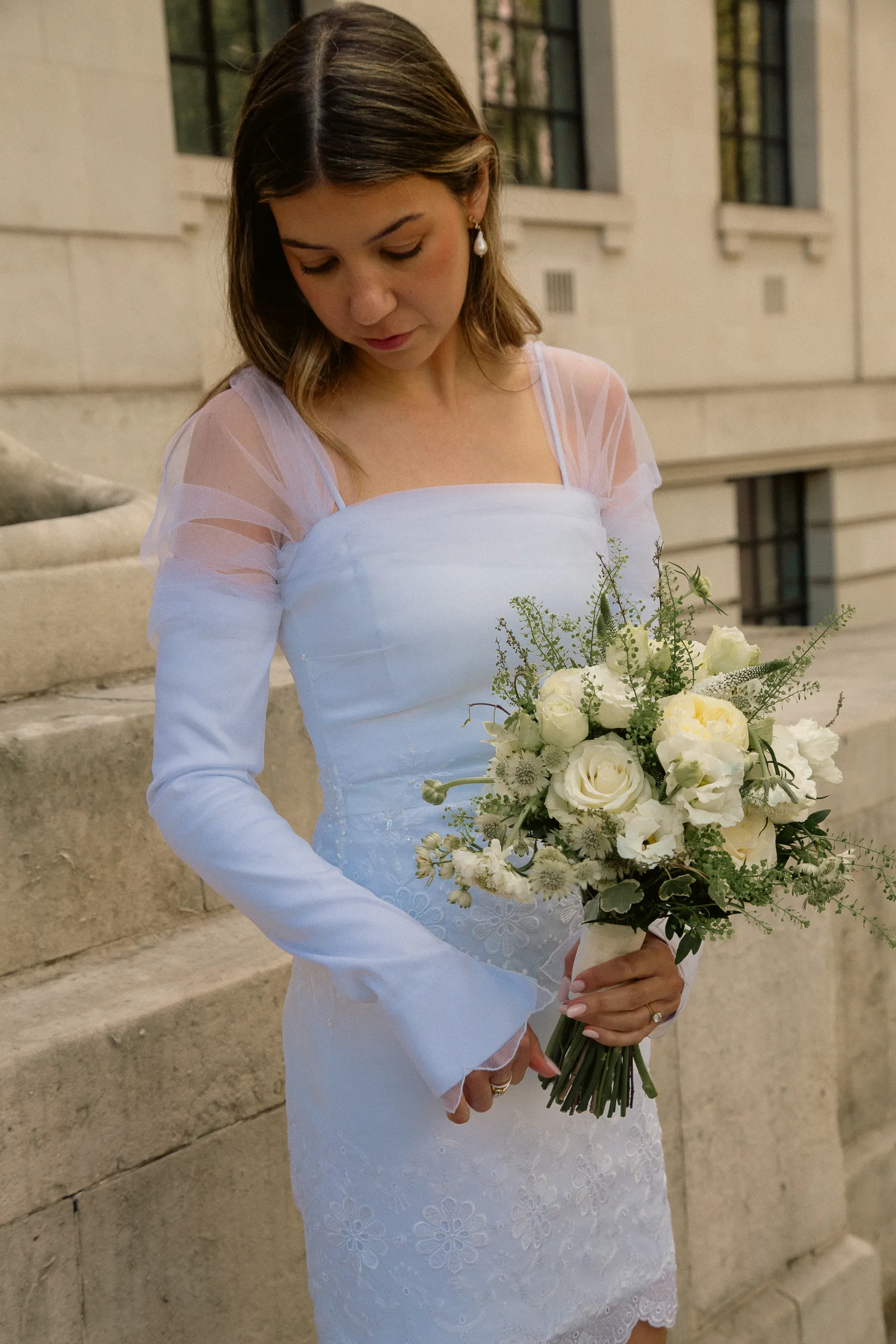 Image may contain Flower Flower Arrangement Flower Bouquet Plant Clothing Dress Fashion Formal Wear and Gown