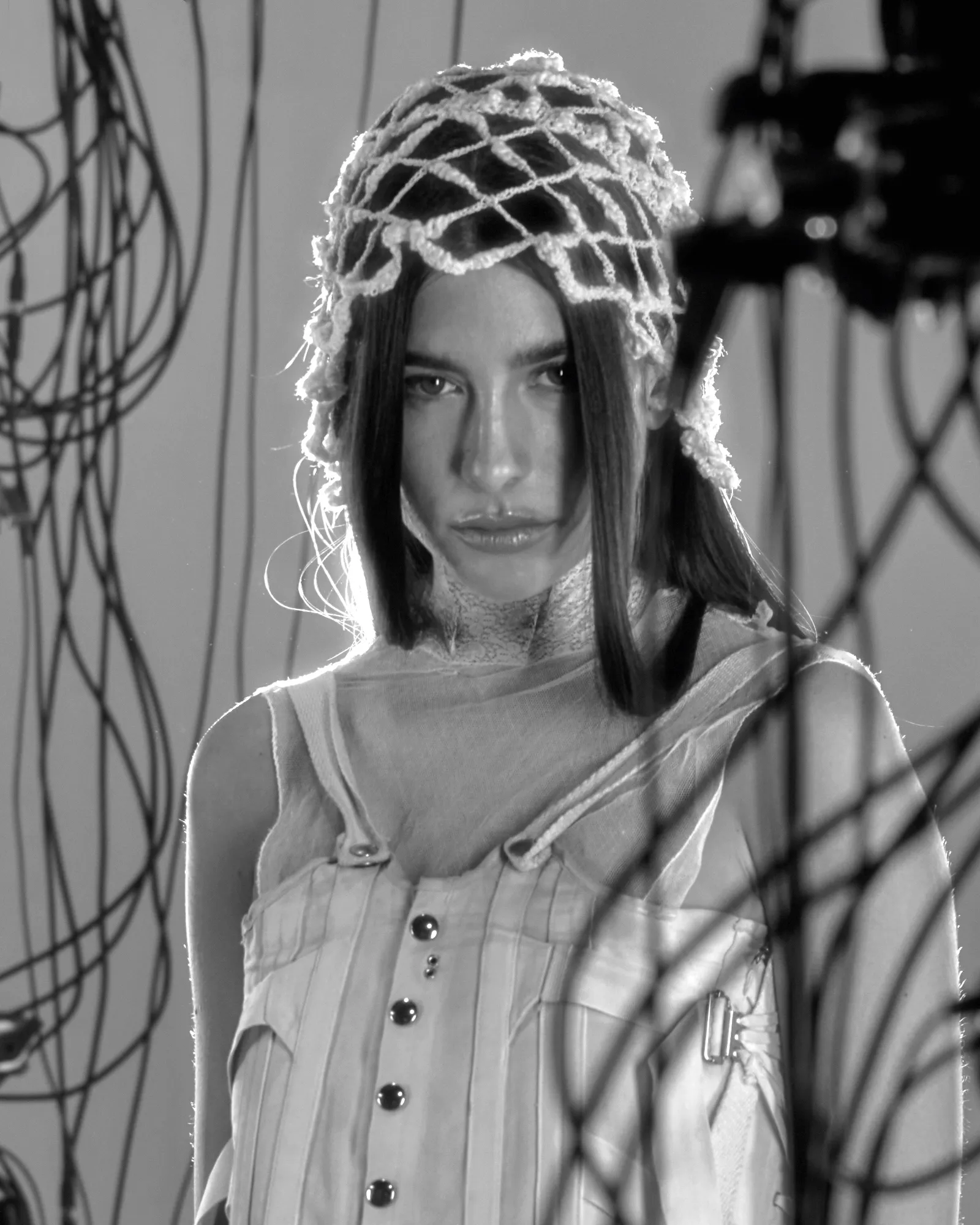 Portrait of fashion designer Evangelina Julia wearing linen dress and crochet hat