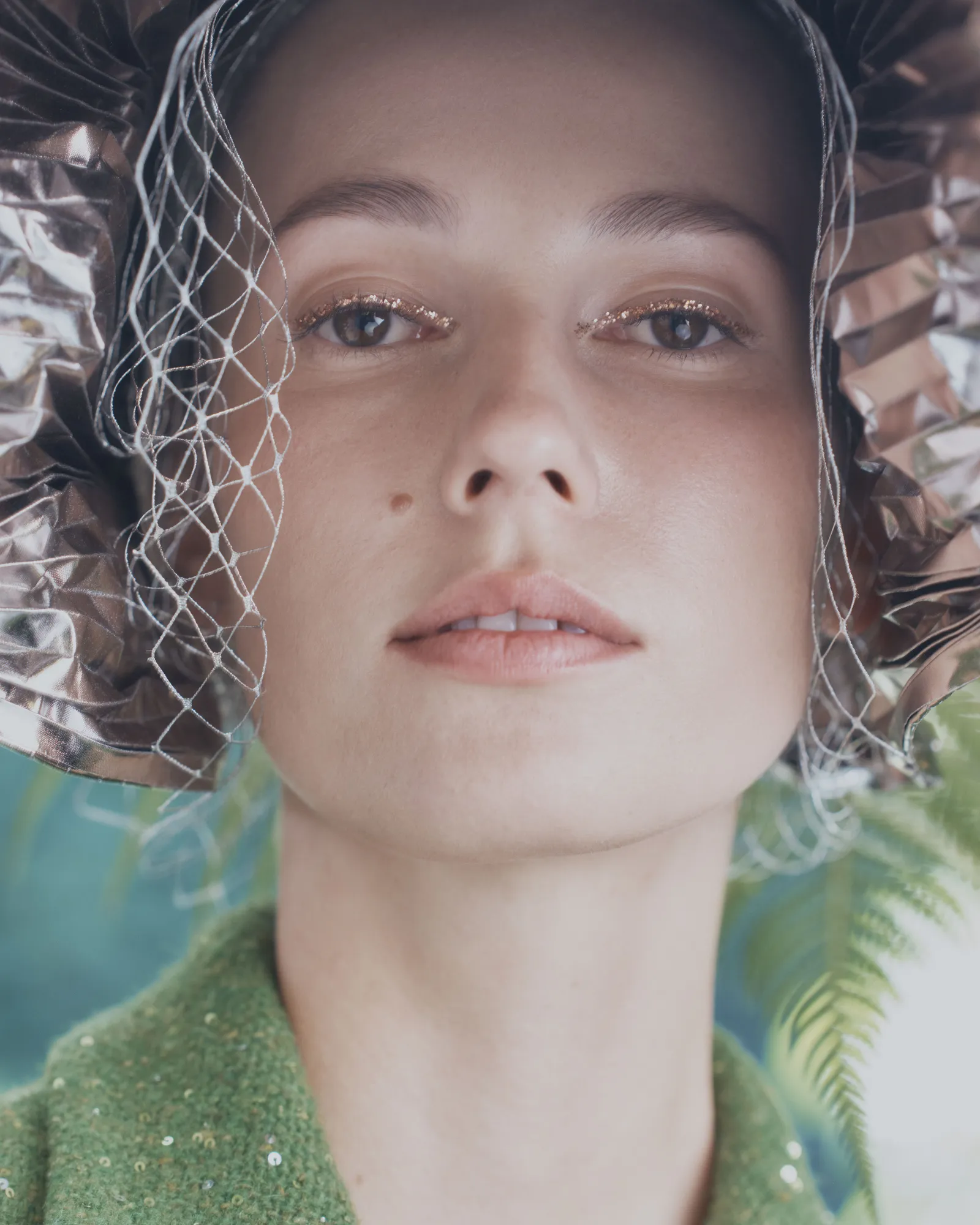 Image may contain Head Person Face Photography Portrait Clothing Hat Body Part and Neck